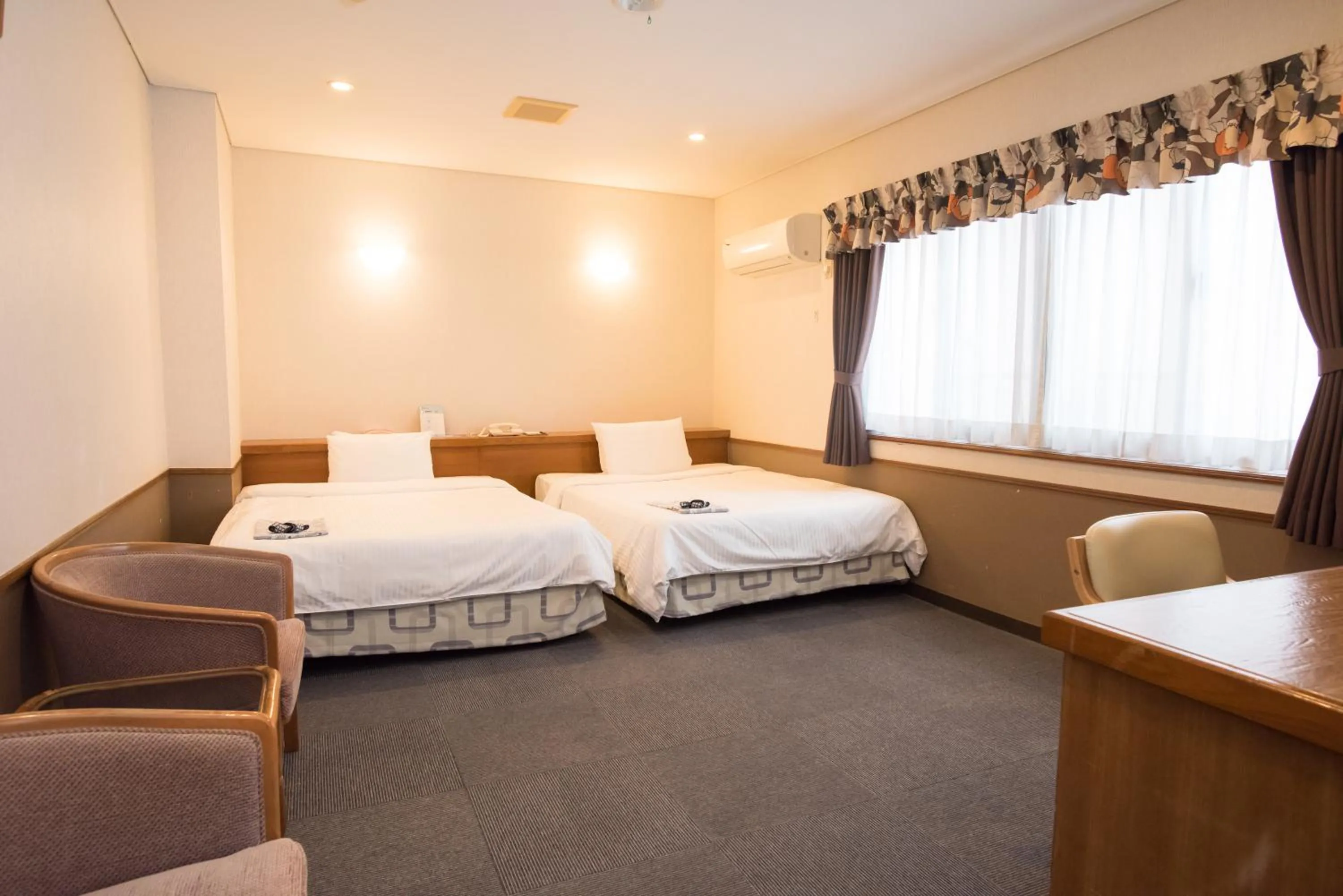 Bed in Crown Hotel Okinawa