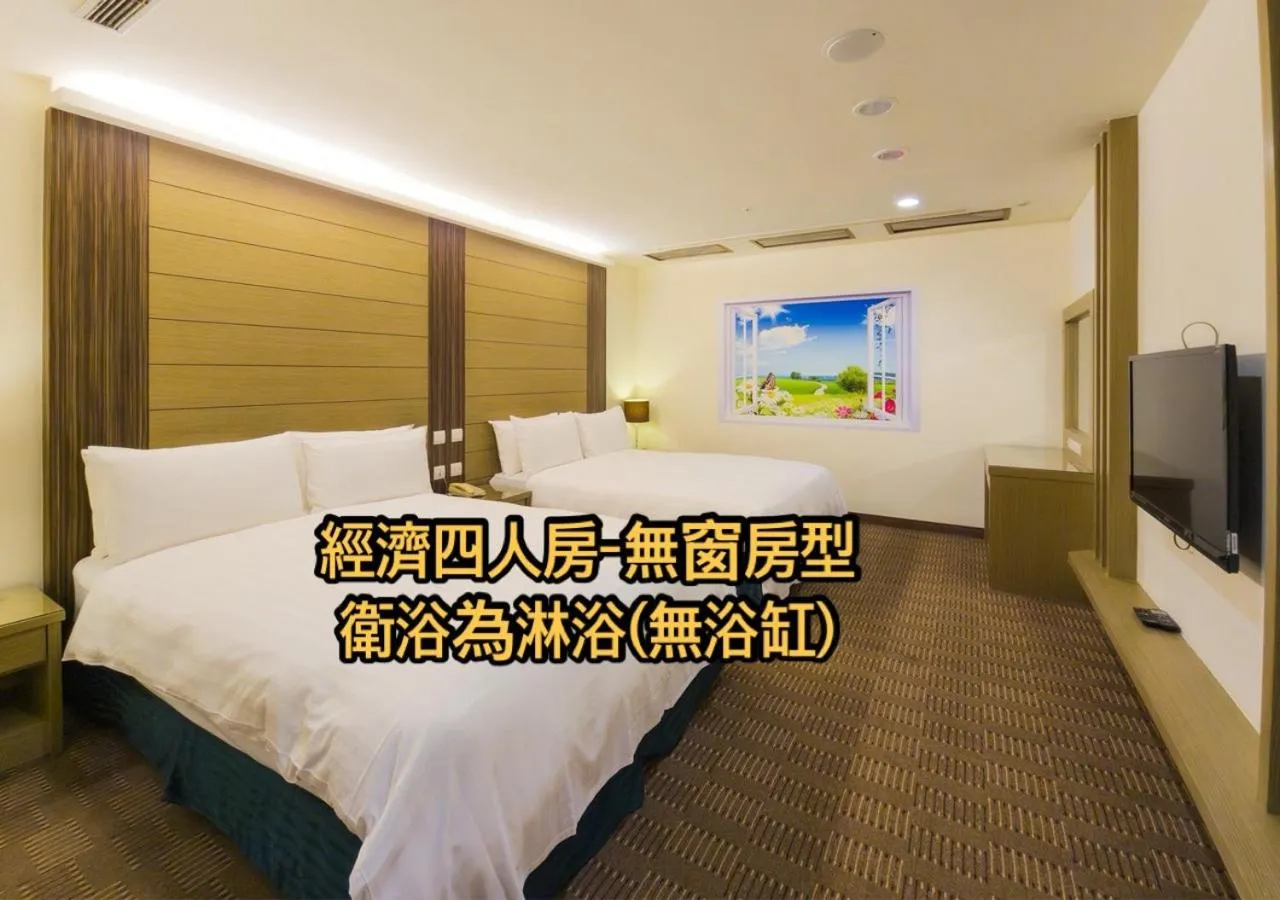 Bed in Cheng Wan Grand Hotel