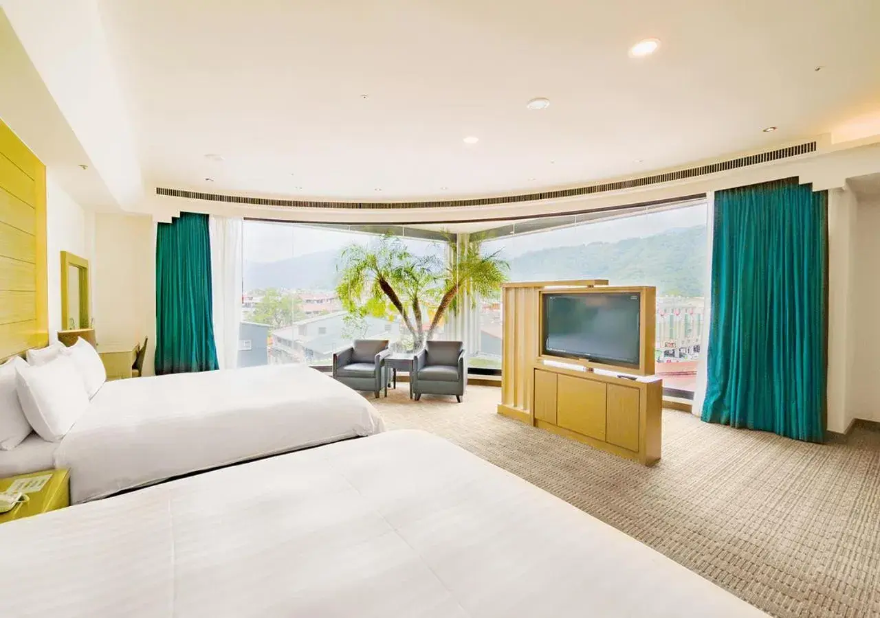 Bedroom, Bed in Cheng Wan Grand Hotel Bedroom, Bed in Cheng Wan Grand Hotel