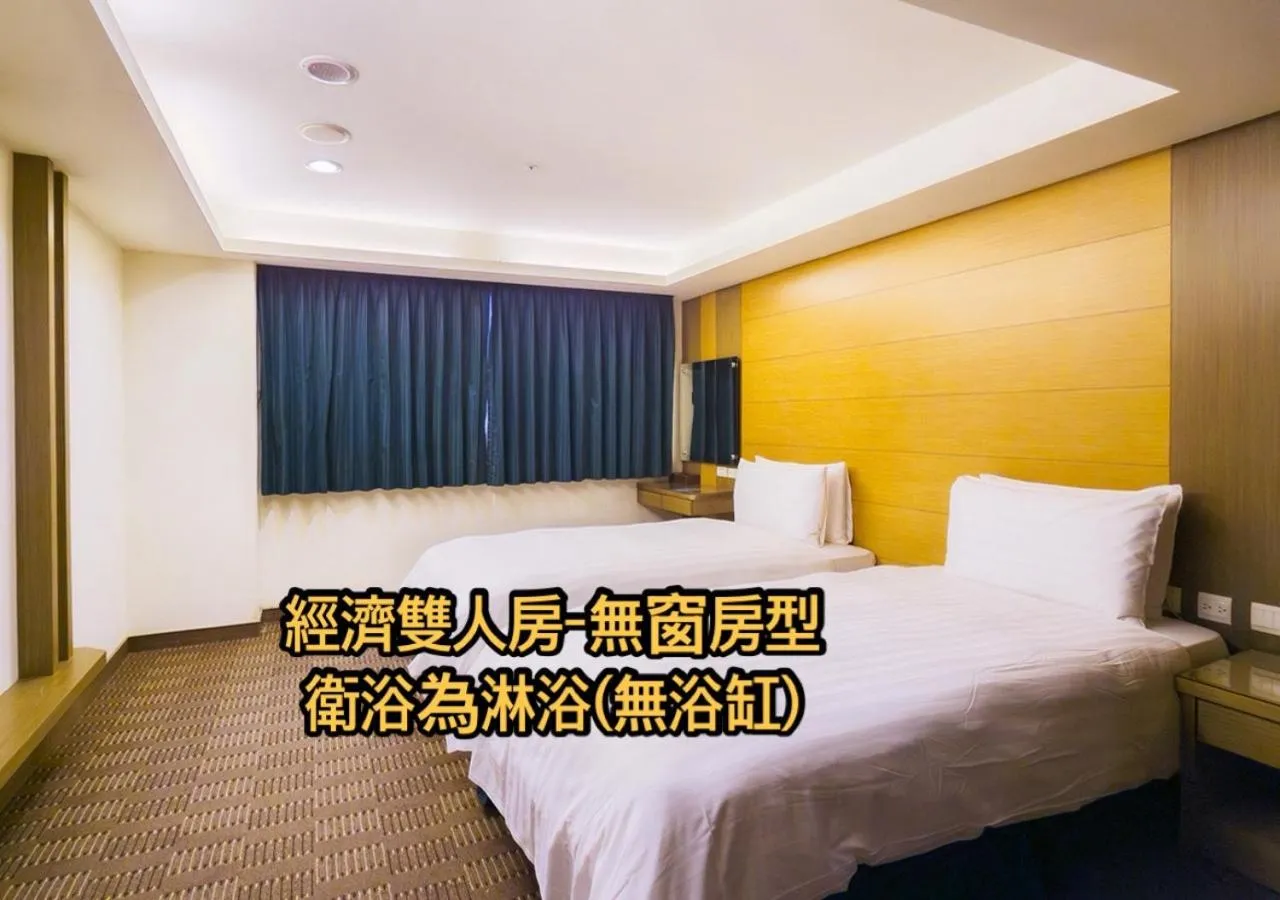 Bed in Cheng Wan Grand Hotel