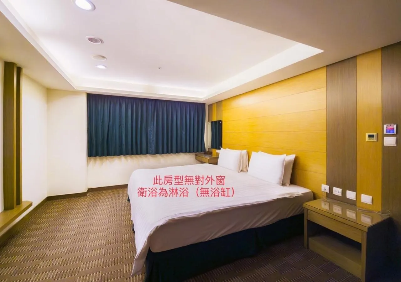 Bed in Cheng Wan Grand Hotel