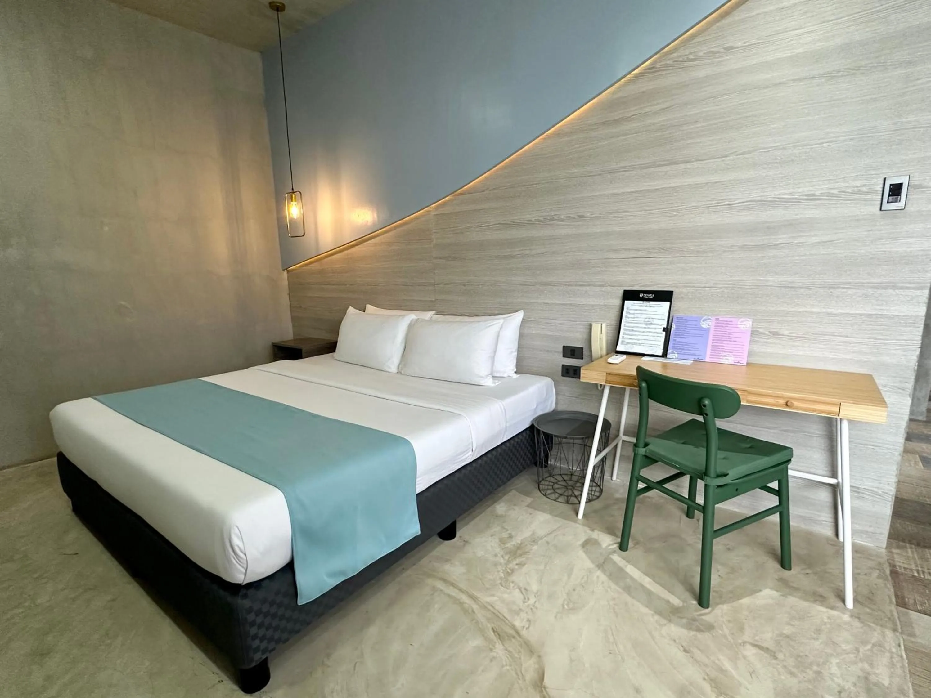 Bed in Zenvea Hotel
