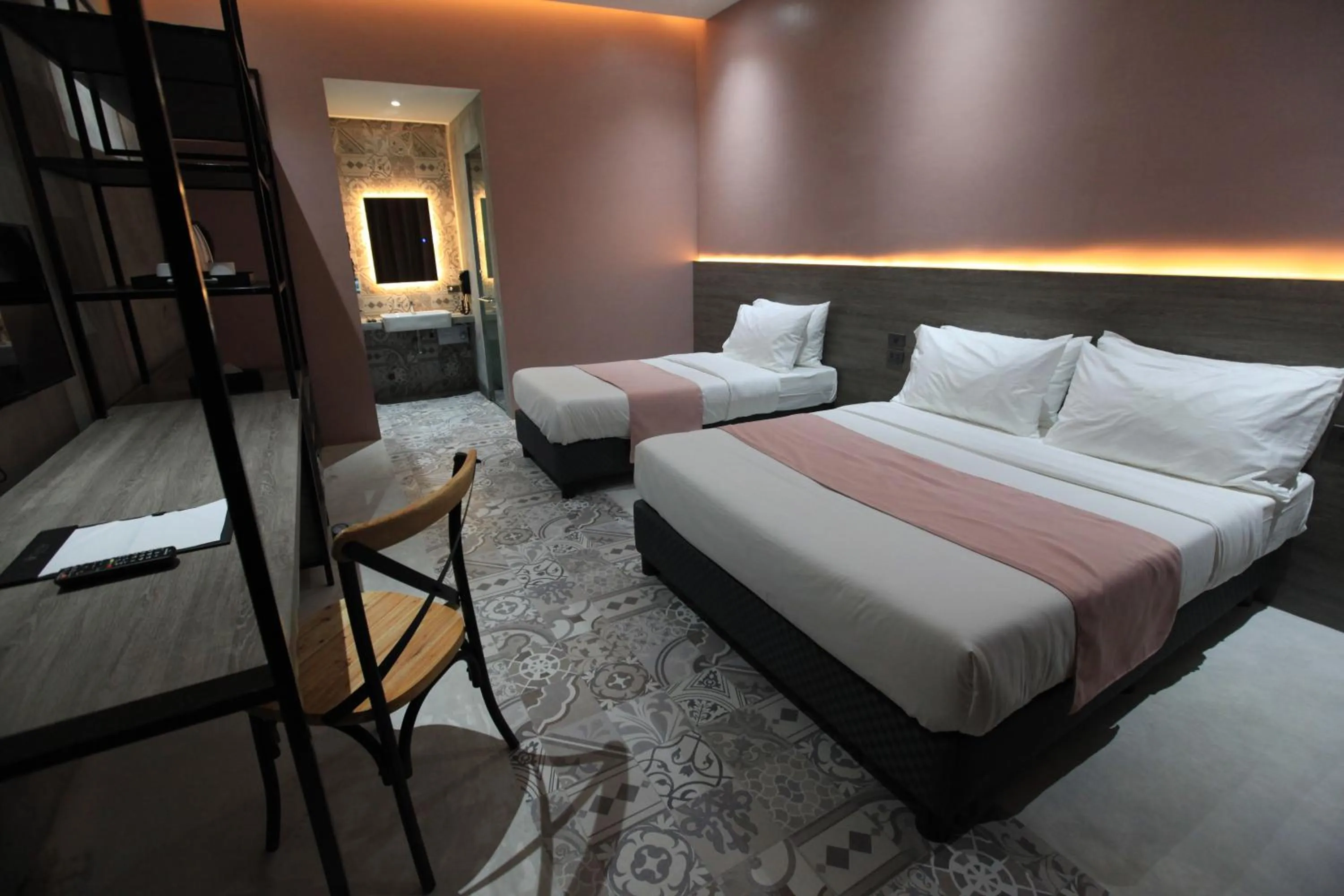 Bed in Zenvea Hotel