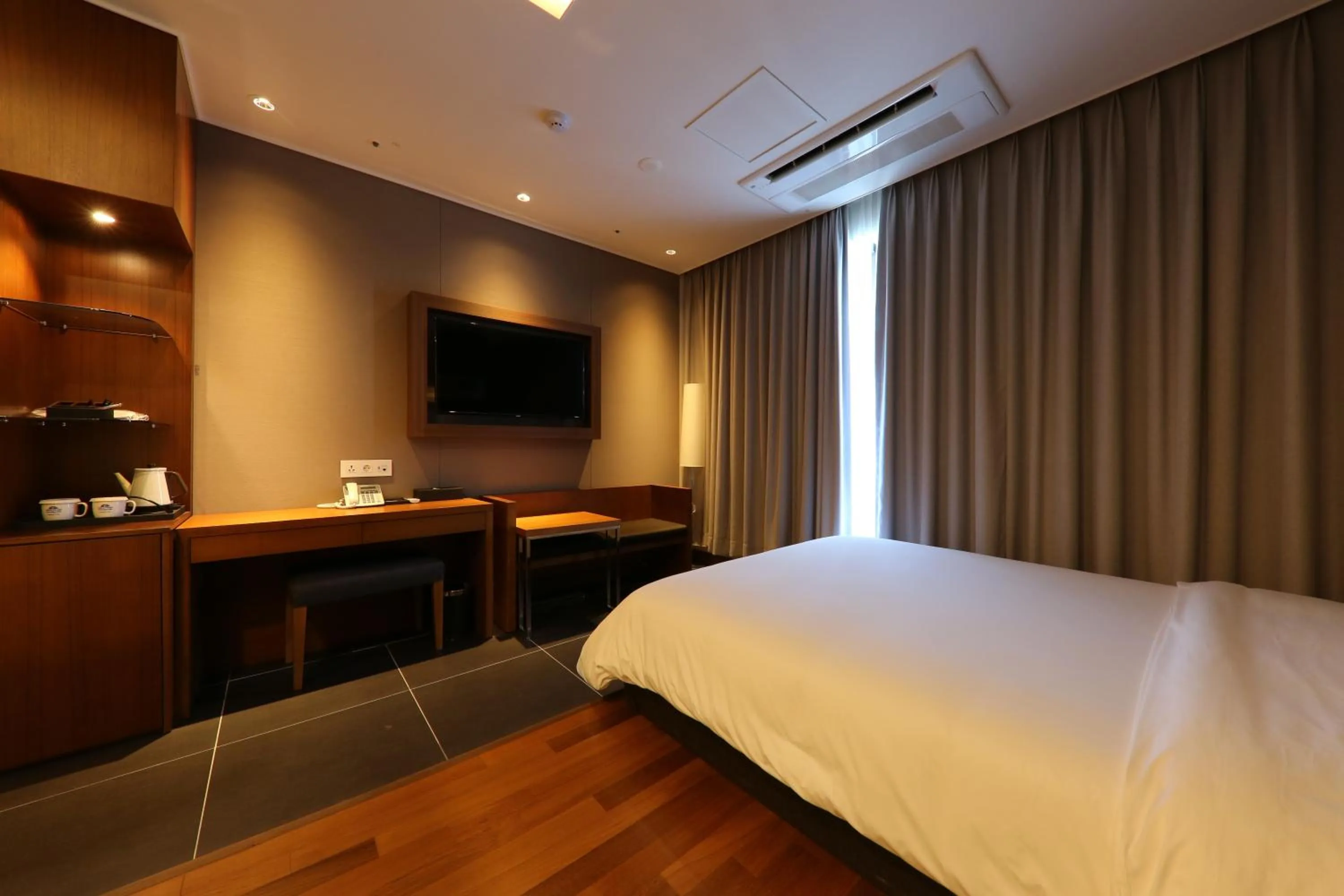 Bed in Sejong City Osong Hotel