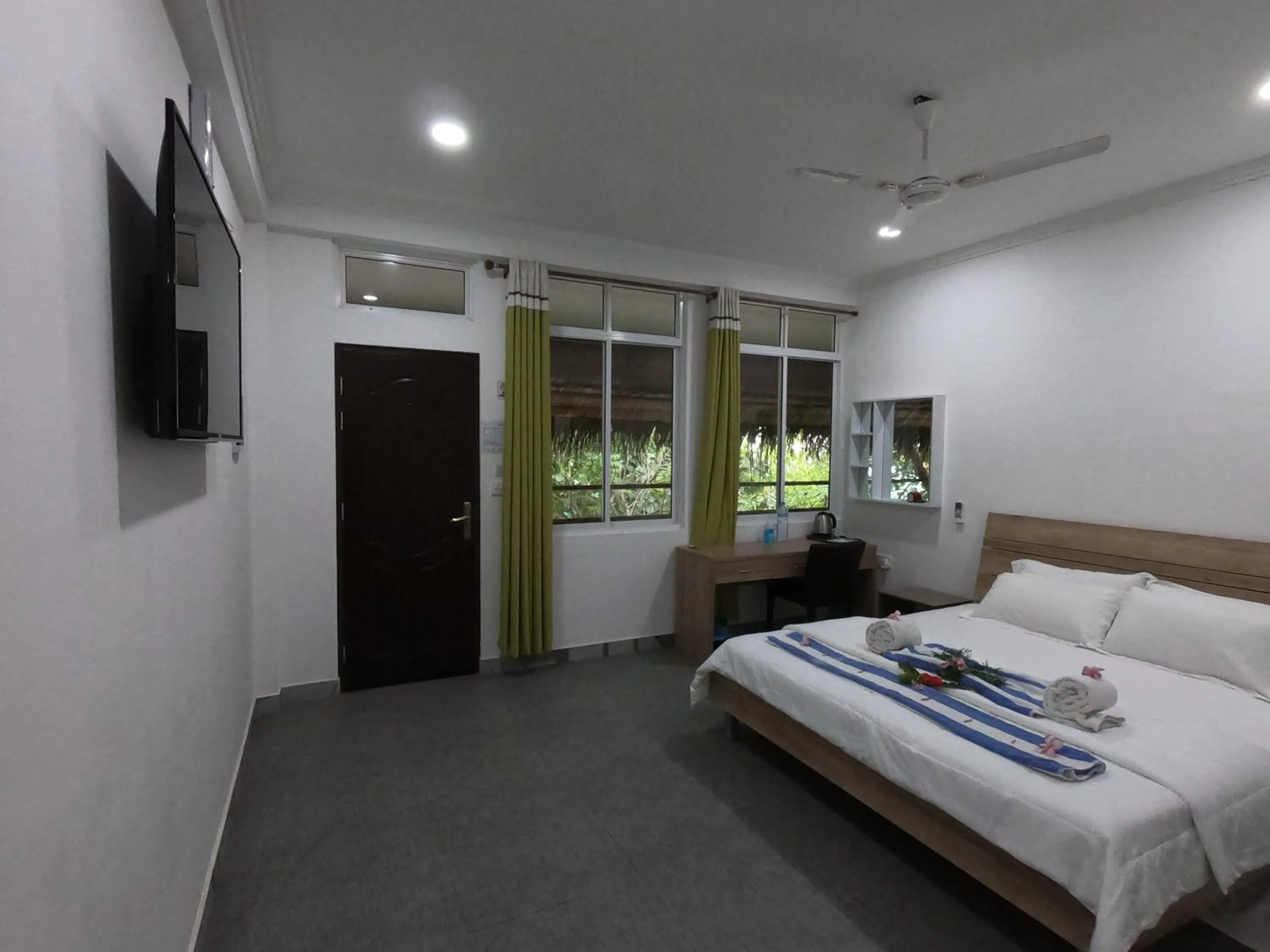 Photo of the whole room, Bed in Dhangethi INN