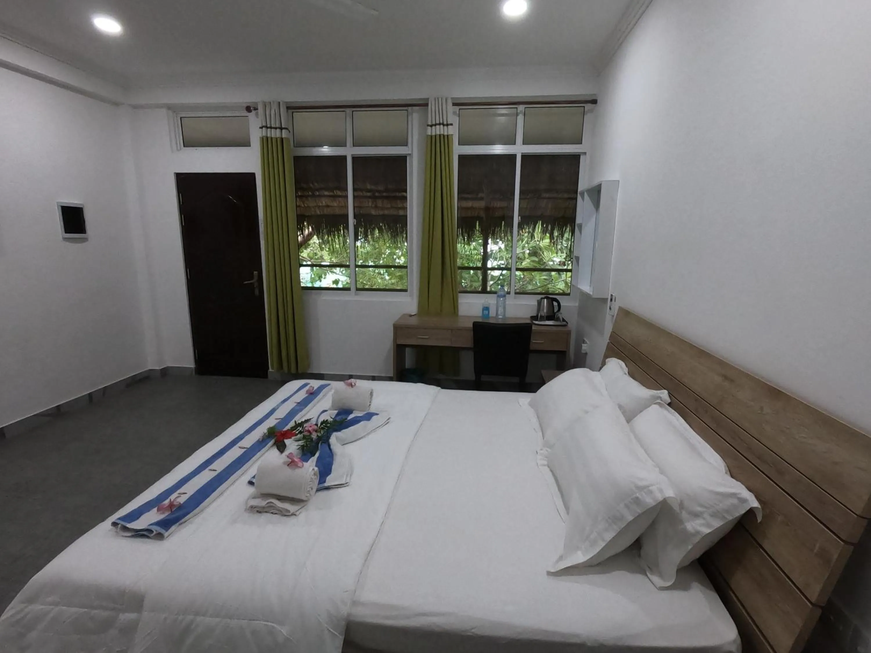 Photo of the whole room, Bed in Dhangethi INN