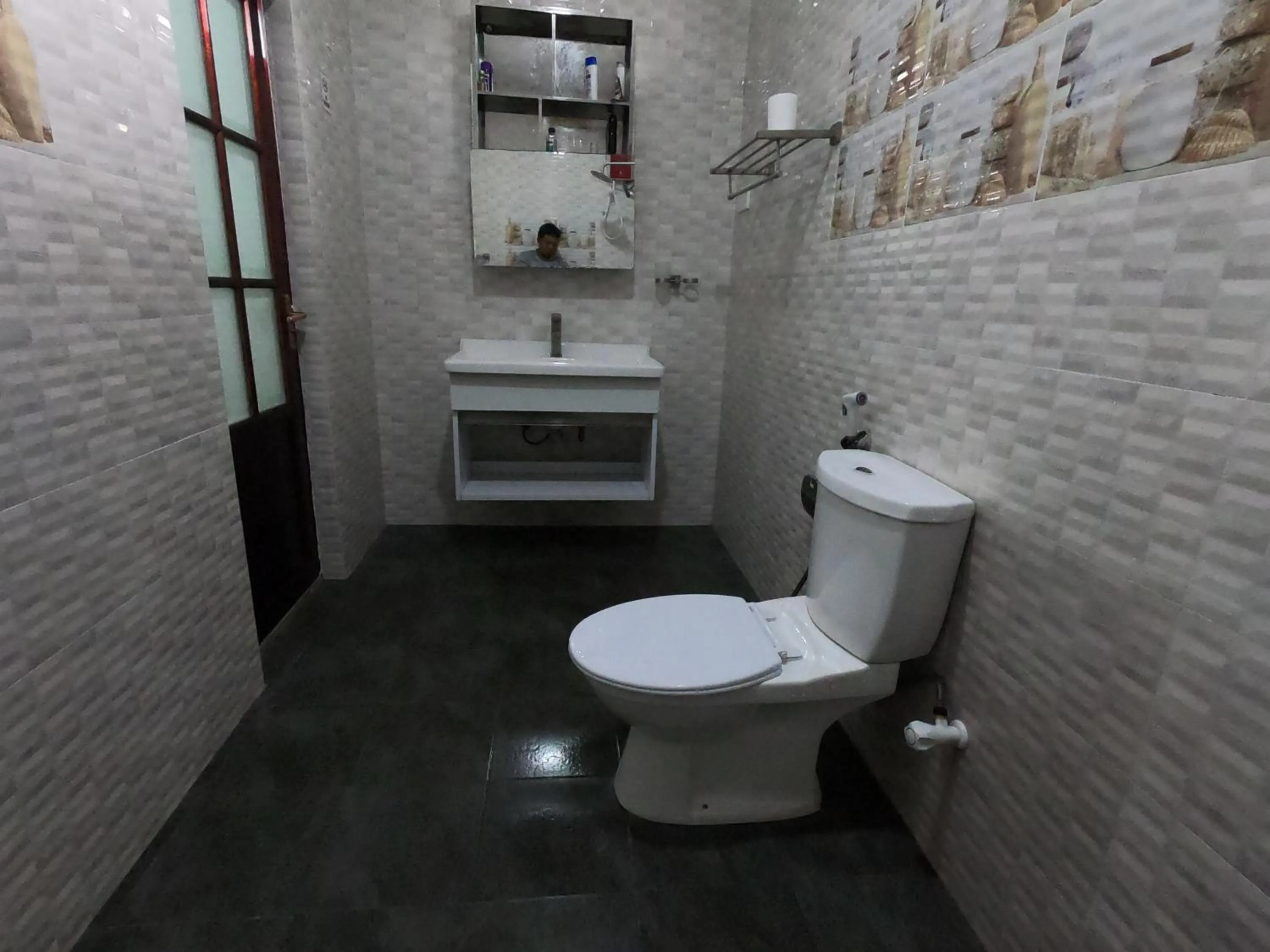 Bathroom in Dhangethi INN