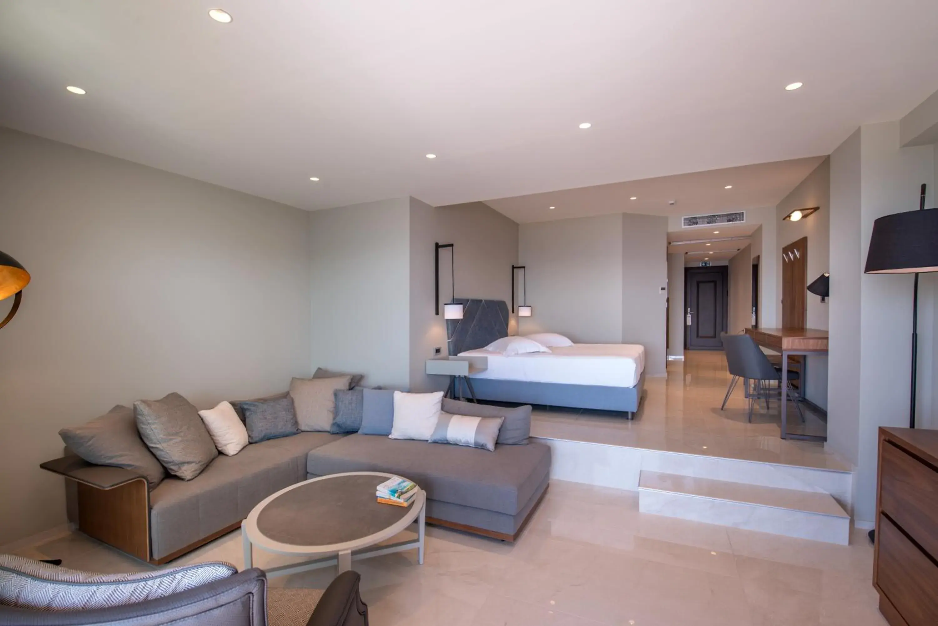 Living room, Bed in Sivota Diamond Spa Resort Living room, Bed in Sivota Diamond Spa Resort