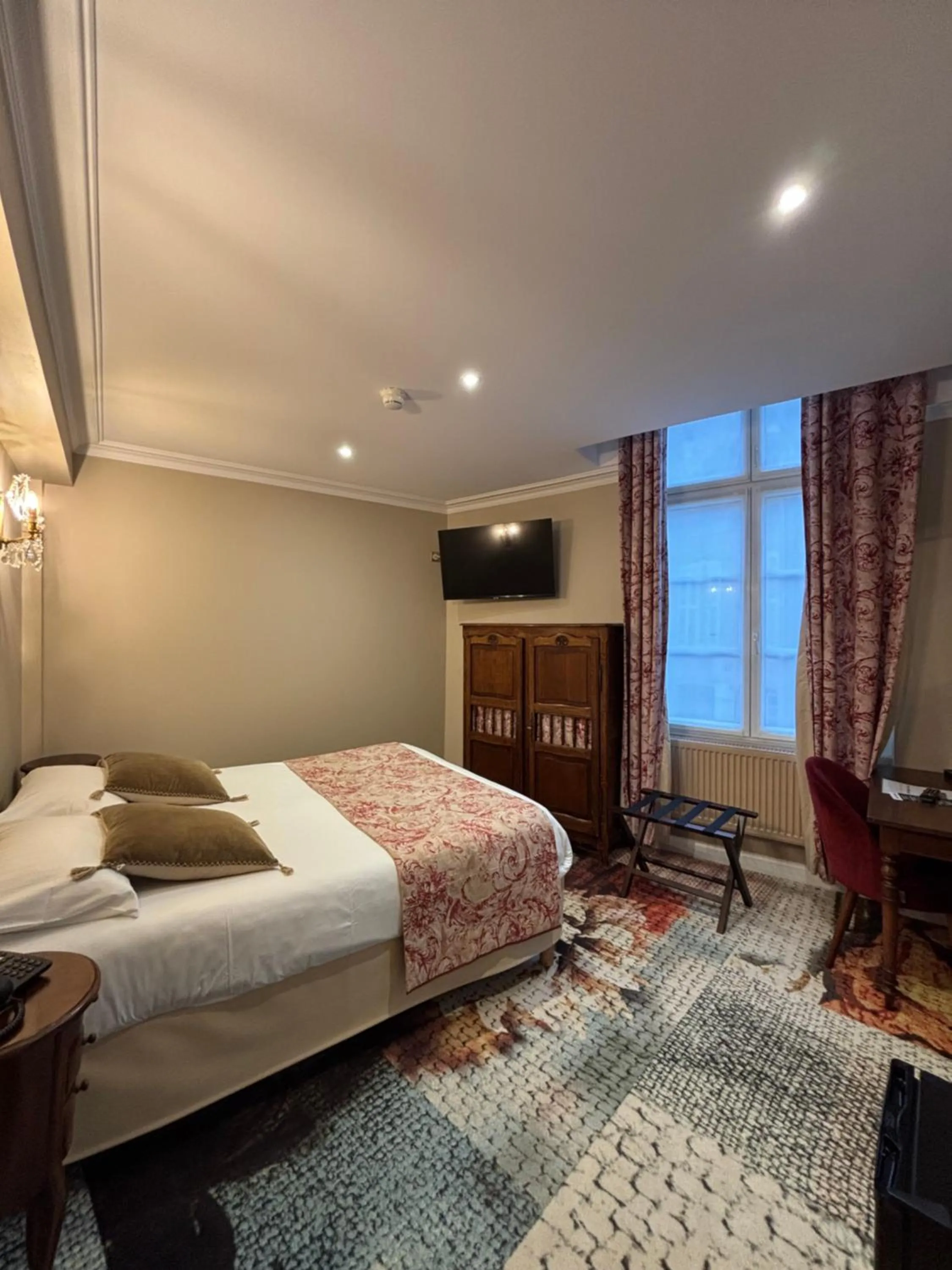 Bed in Hotel De La Poste