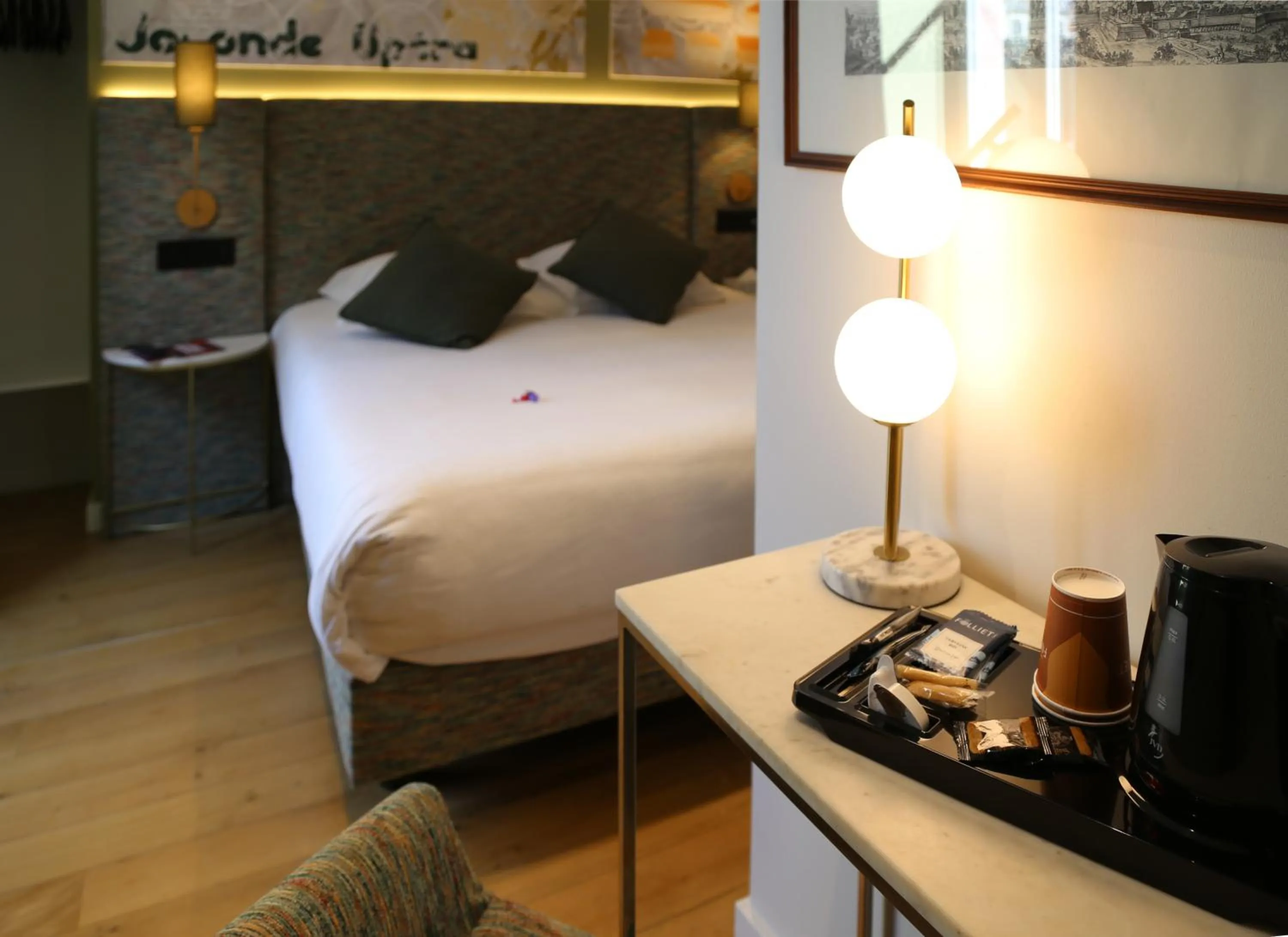 Bed in Le Kléber Hôtel