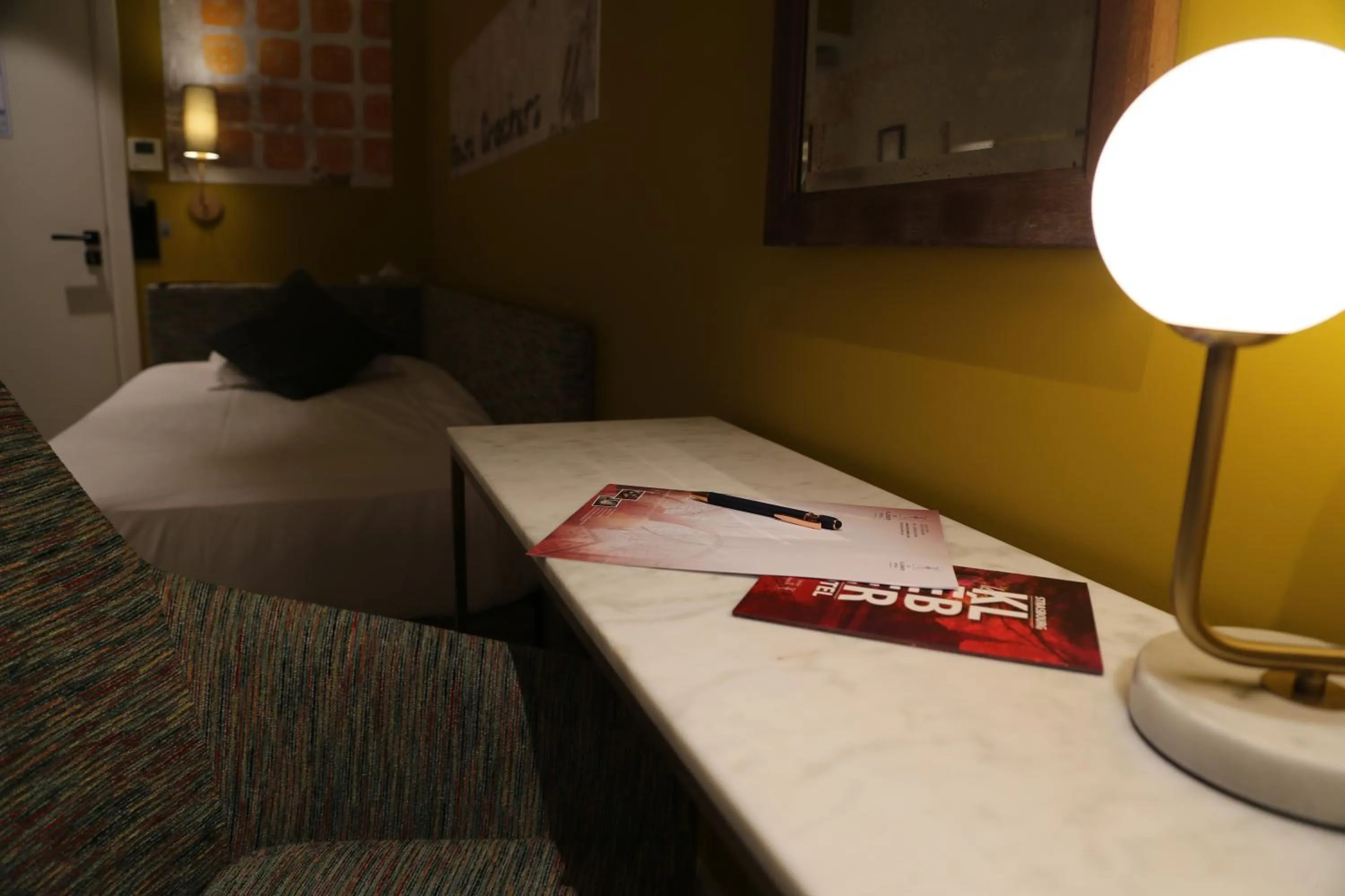 Bed in Le Kléber Hôtel