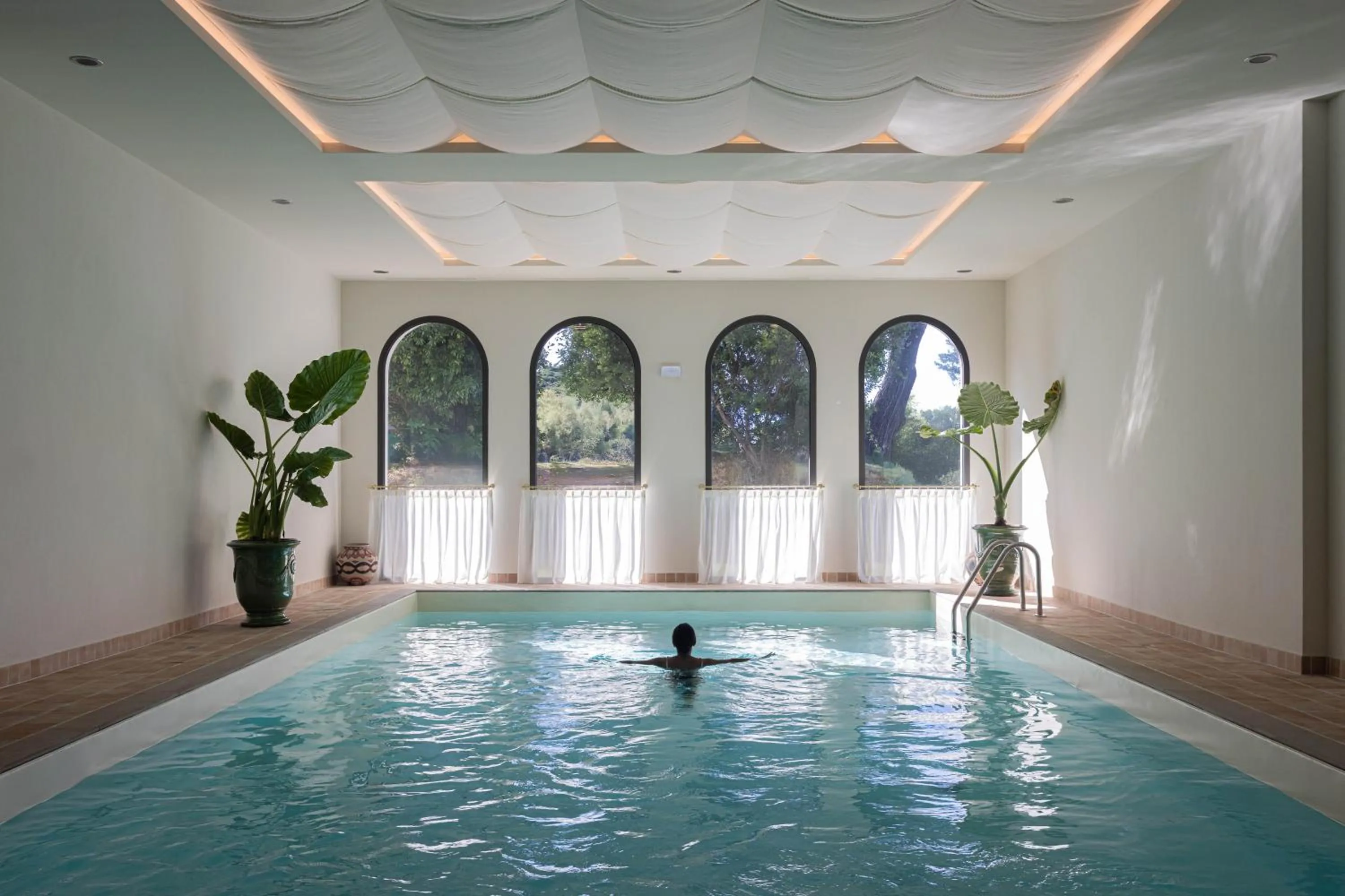 Swimming pool in Hôtel Maison Chiberta