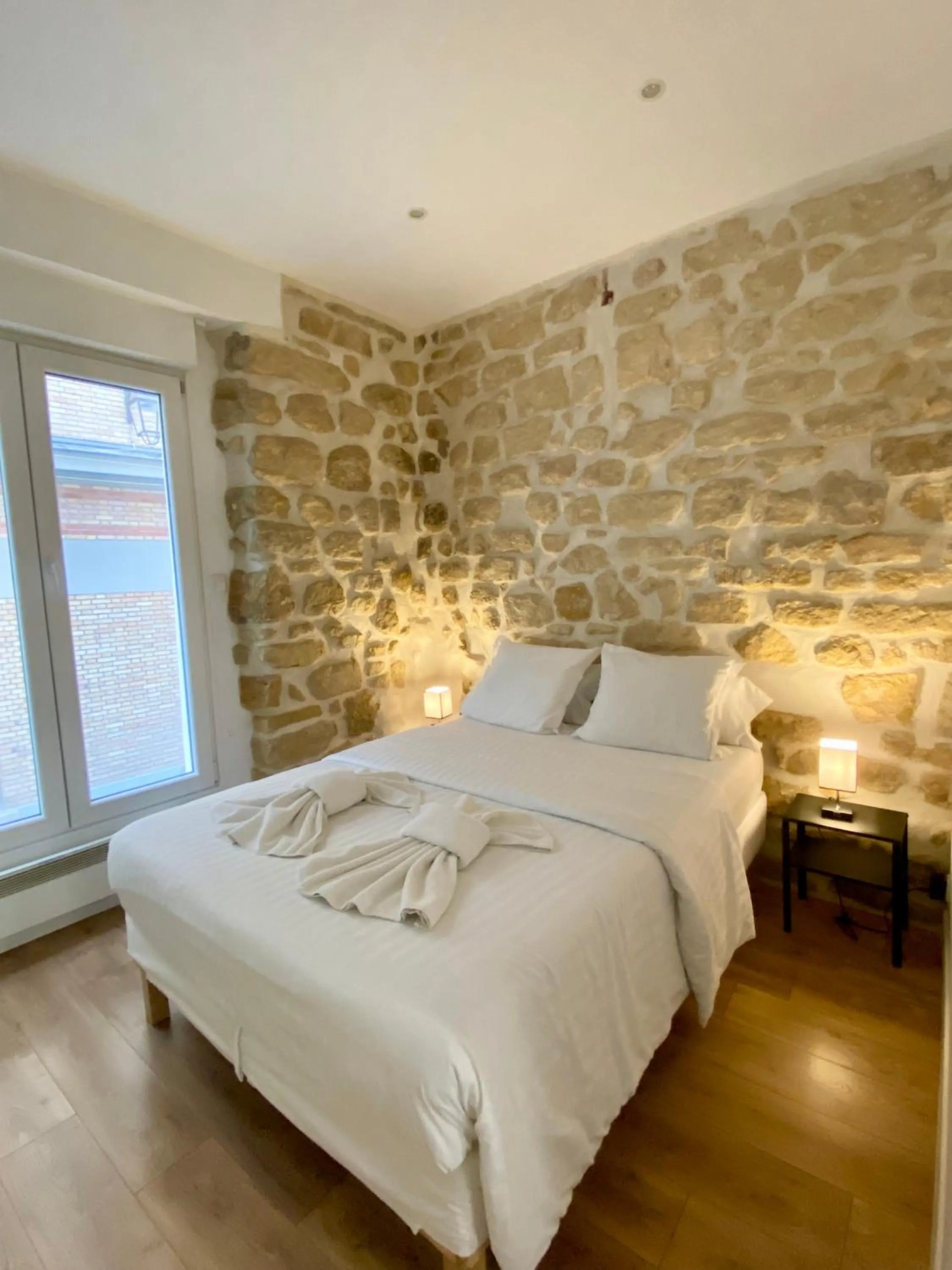 Bed in Maison le Bac Apartments