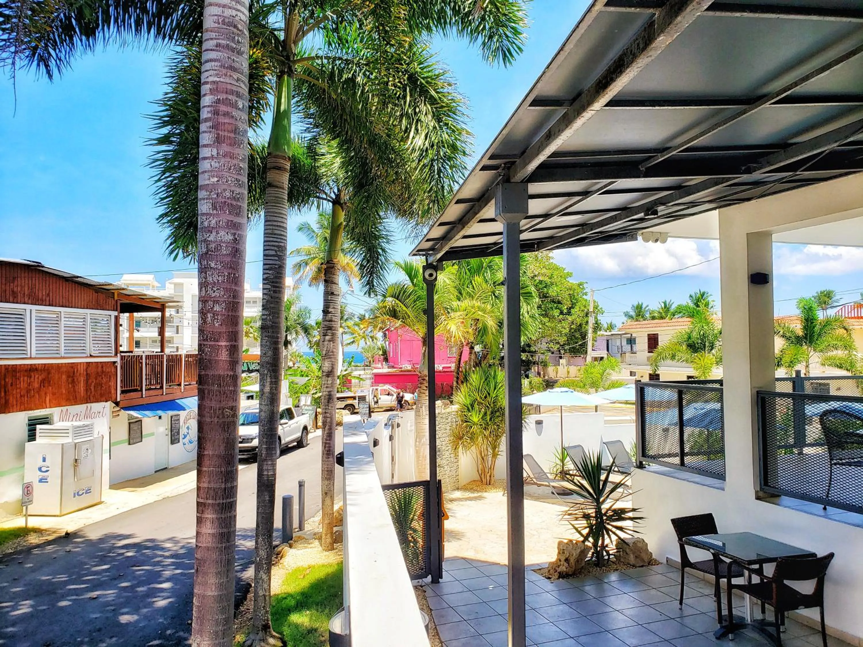 Patio in Casa Verde Hotel - Steps to the Beach, Pool, Restaurant & Bar
