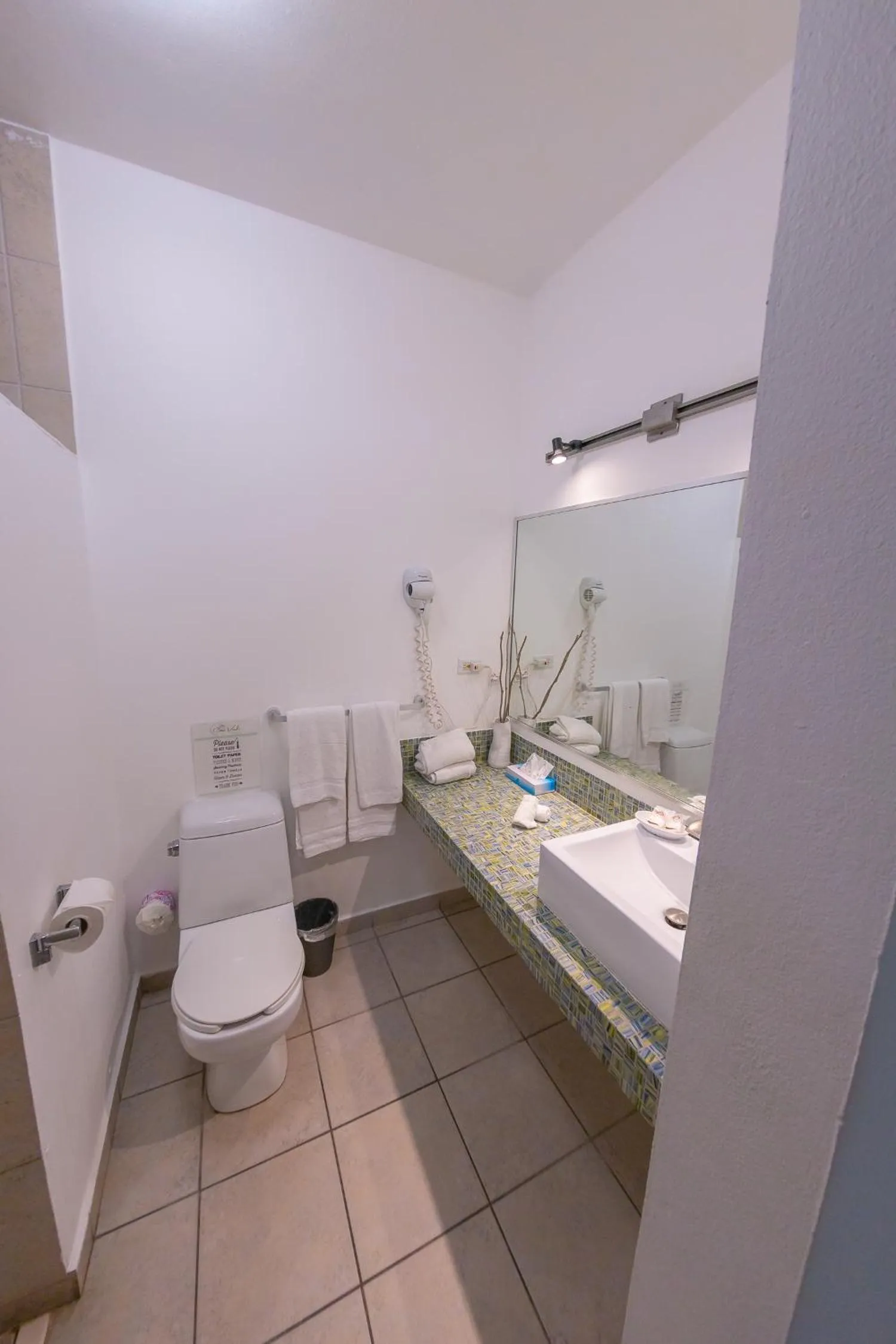 Bathroom in Casa Verde Hotel - Steps to the Beach, Pool, Restaurant & Bar