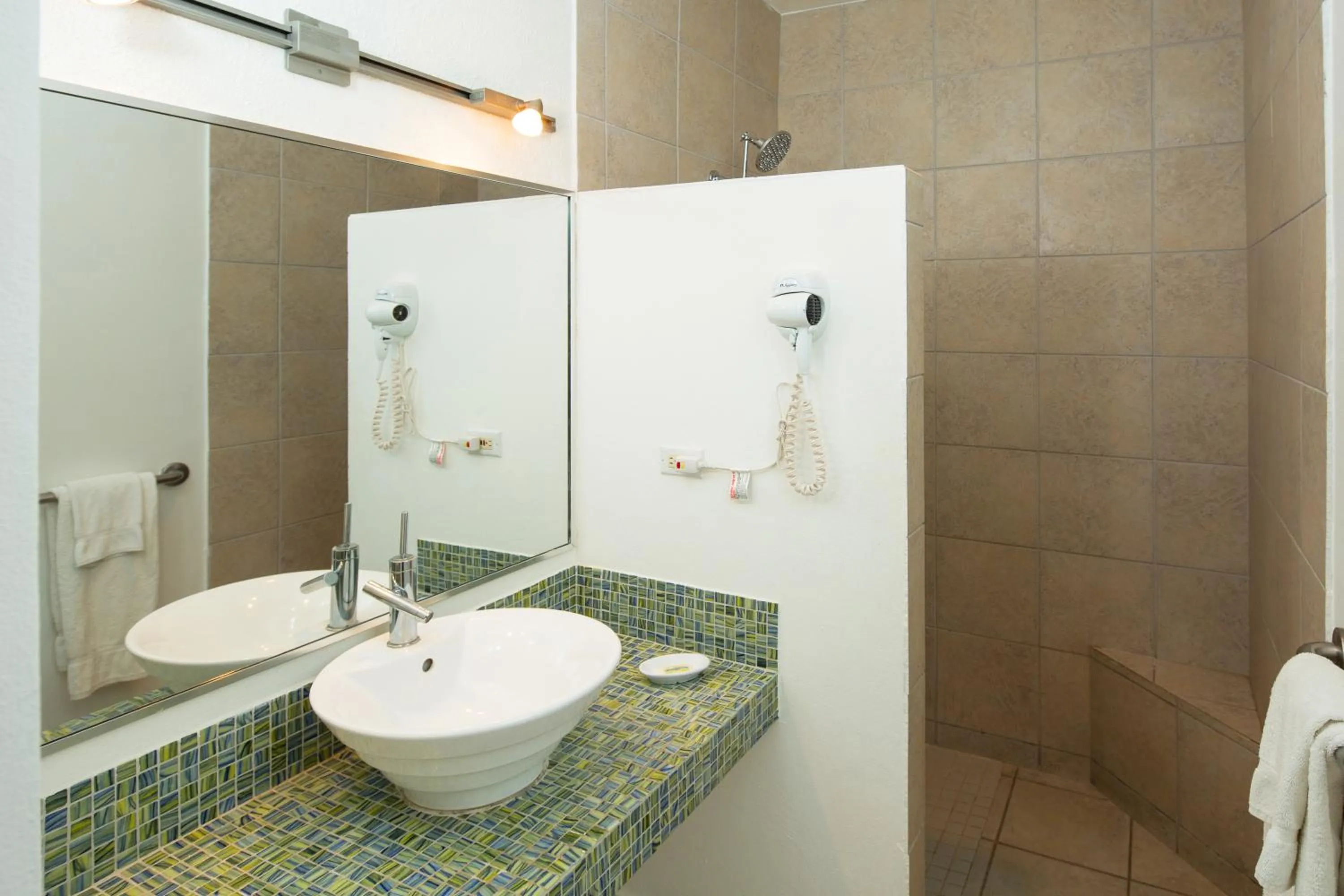 Bathroom in Casa Verde Hotel - Steps to the Beach, Pool, Restaurant & Bar