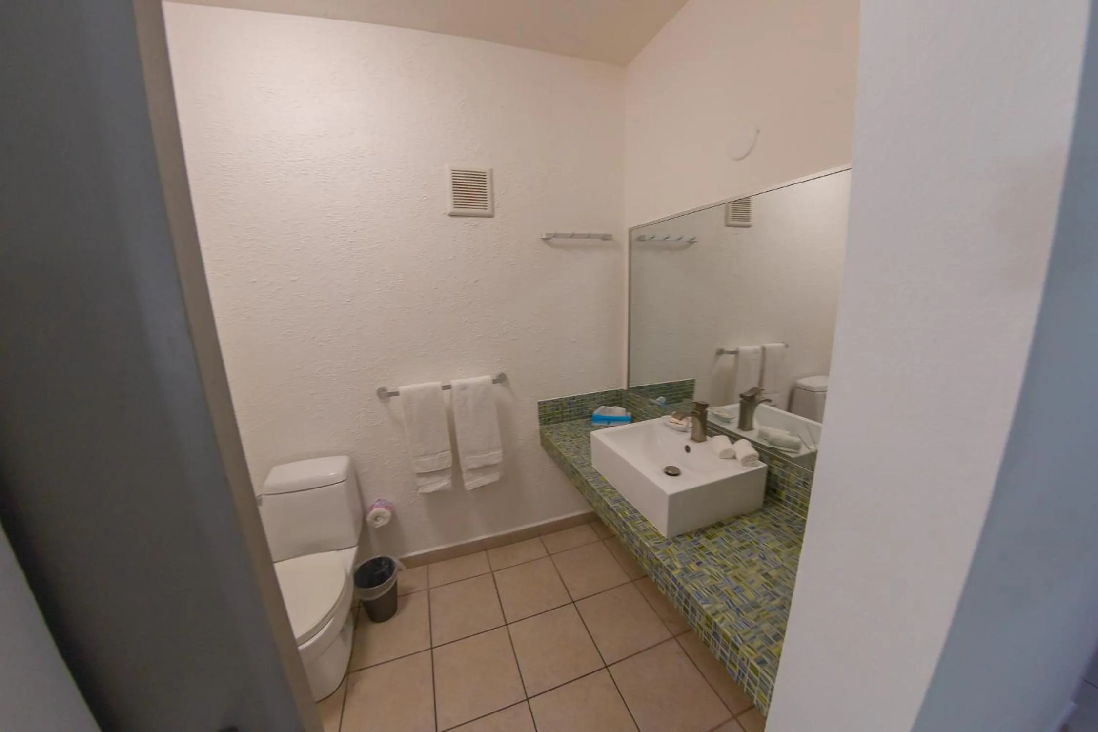Bathroom in Casa Verde Hotel - Steps to the Beach, Pool, Restaurant & Bar