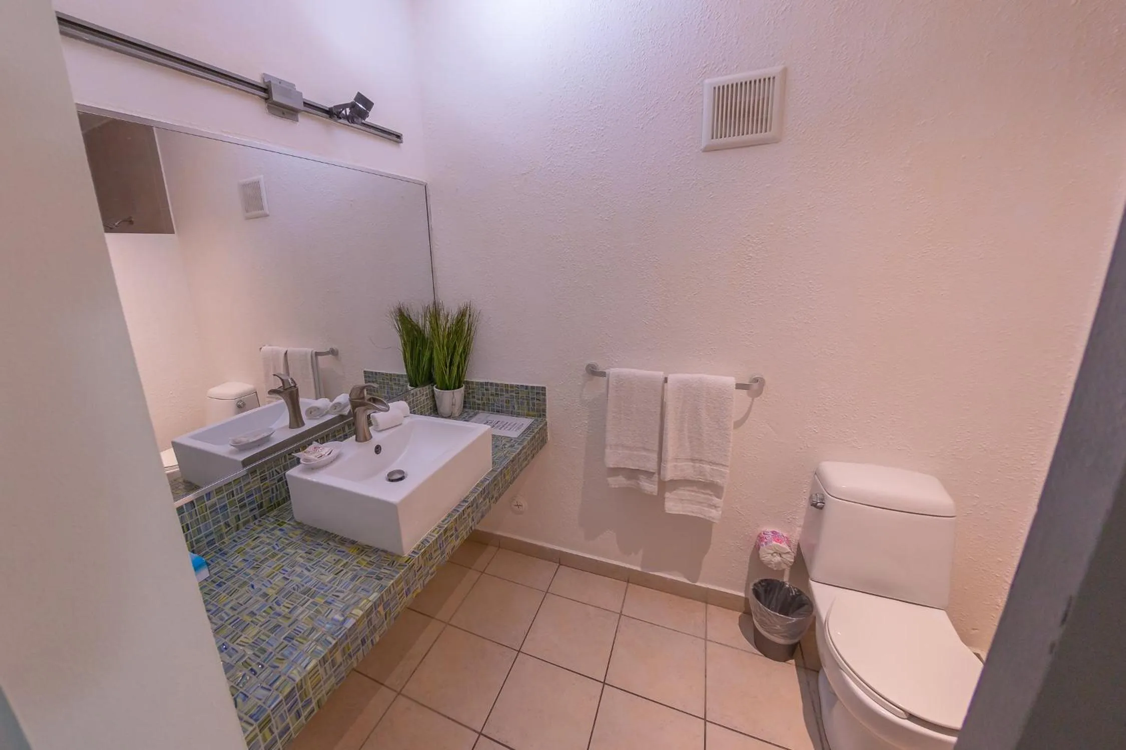 Bathroom in Casa Verde Hotel - Steps to the Beach, Pool, Restaurant & Bar