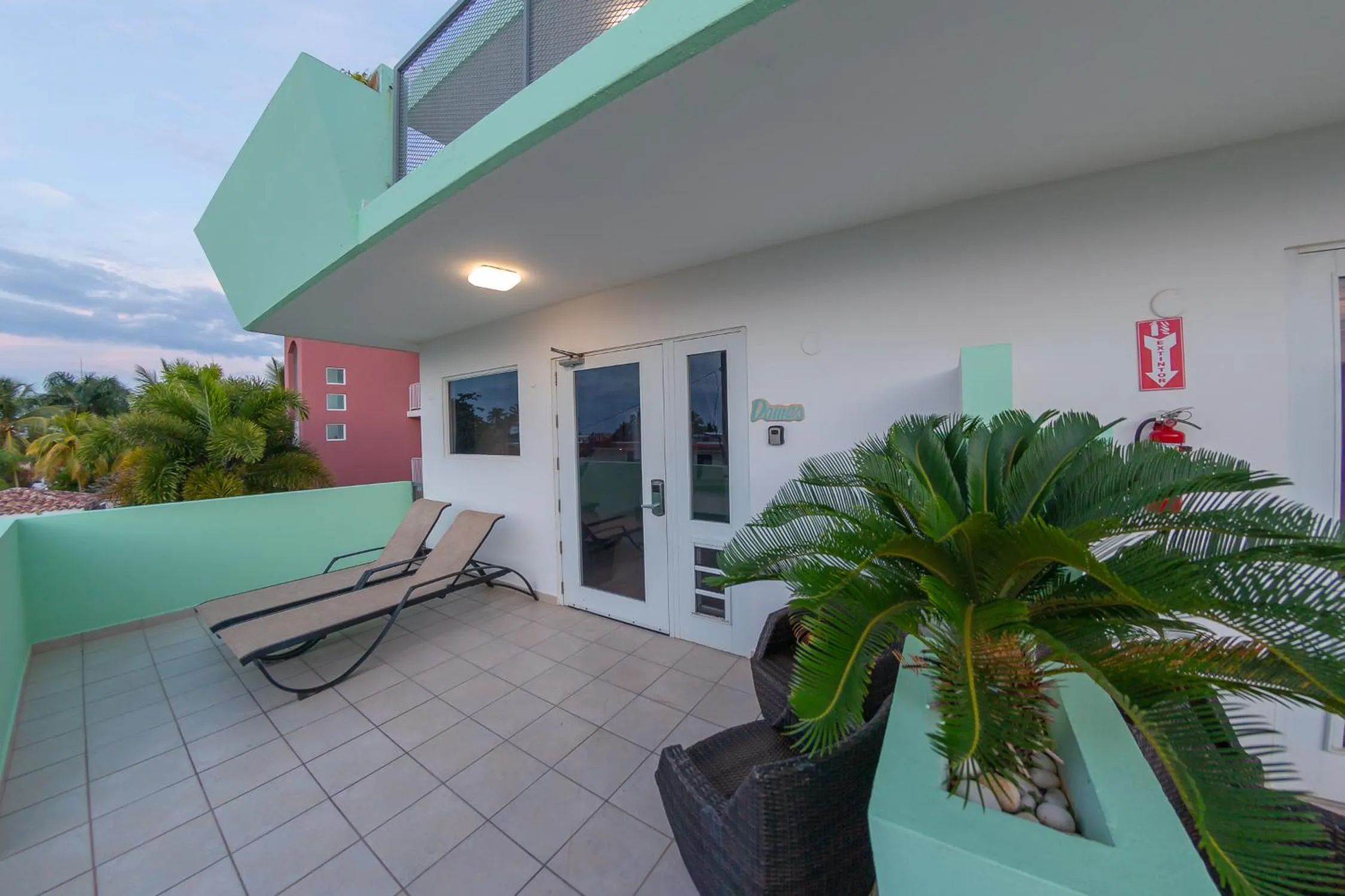 Patio in Casa Verde Hotel - Steps to the Beach, Pool, Restaurant & Bar