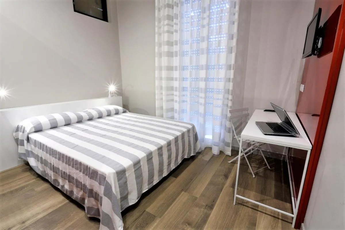 Bed in Hotel Aurea
