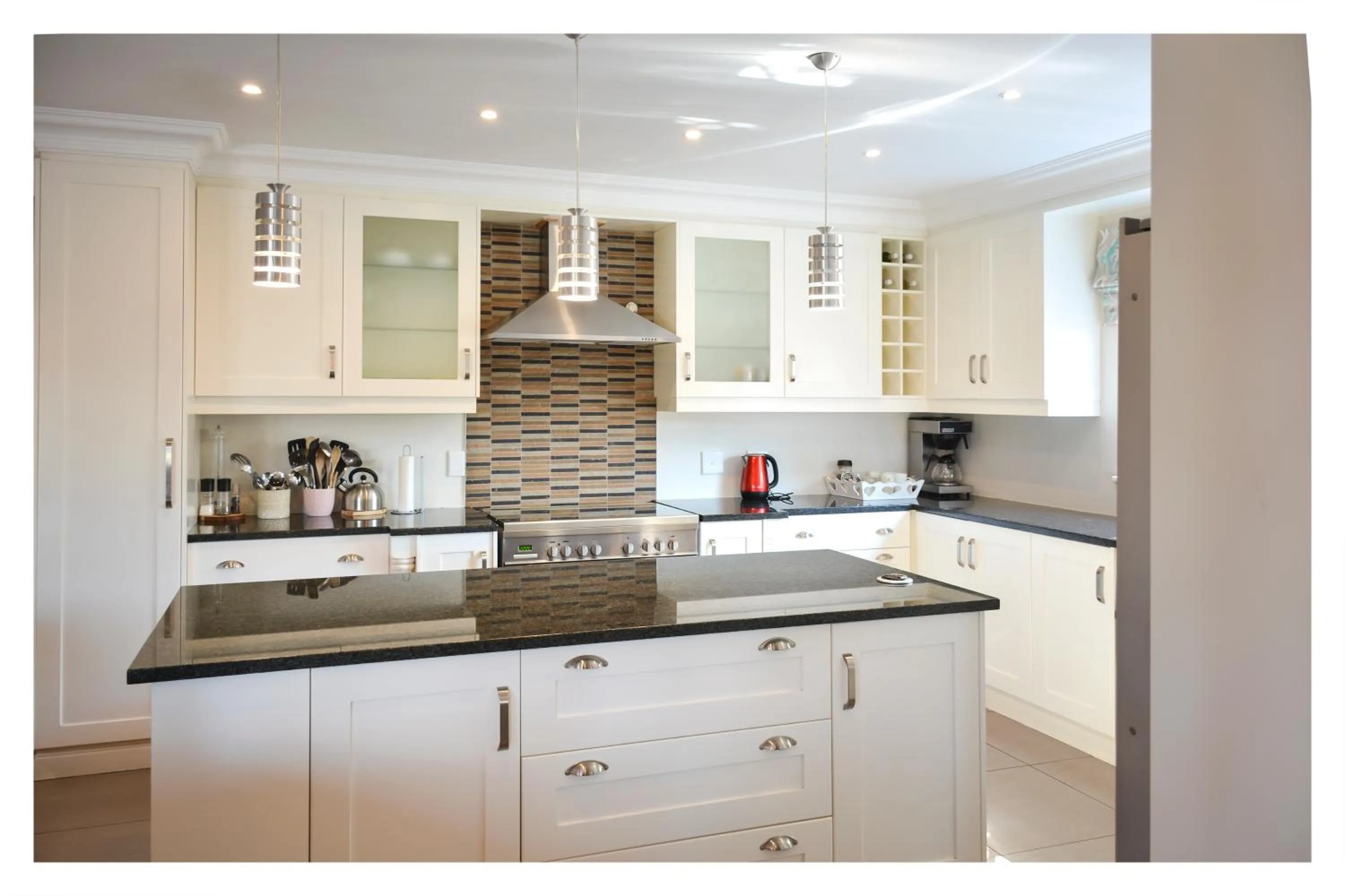 Kitchen or kitchenette in 66 On Monzali 4 Star Luxury Guesthouse