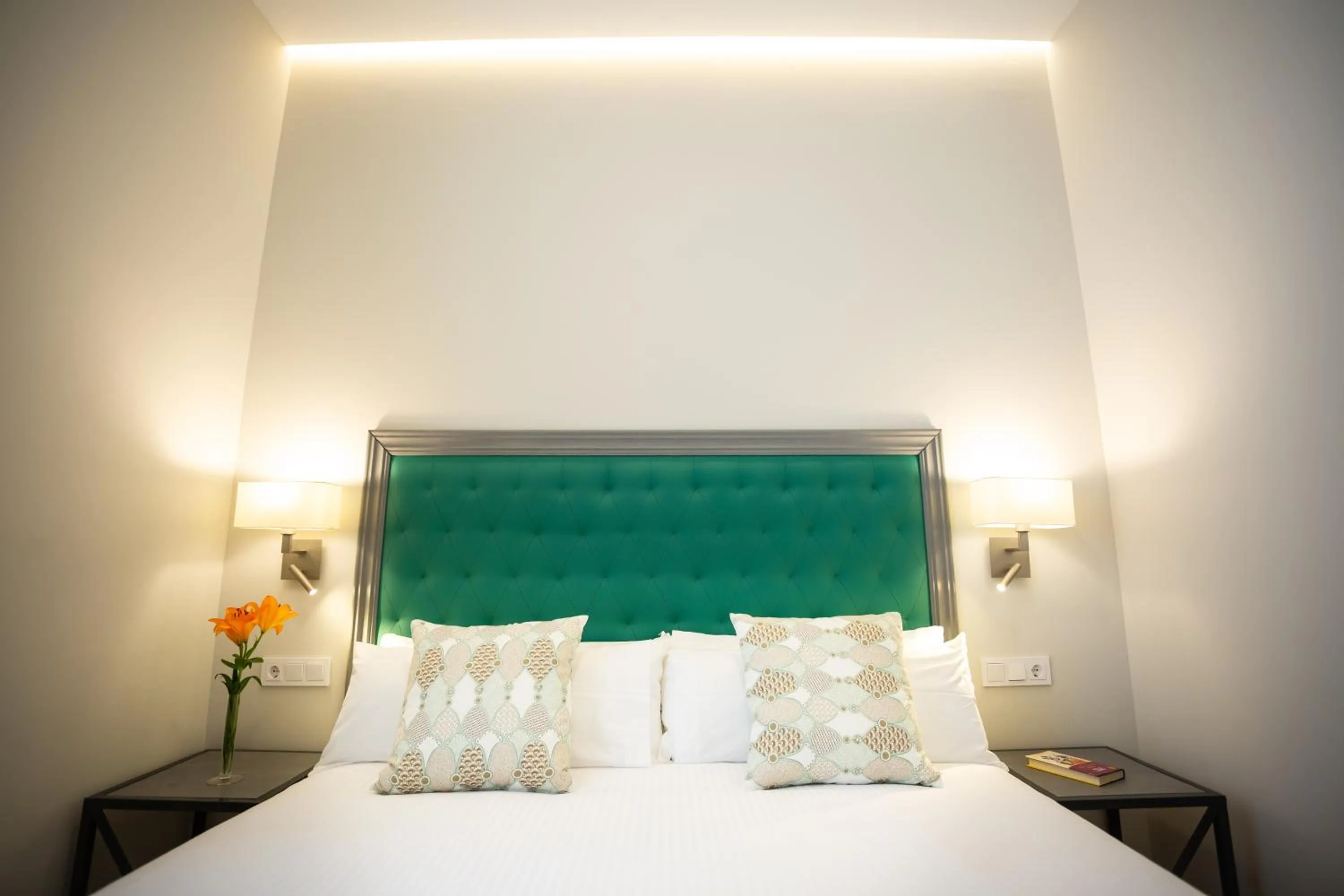 Bed in Plazuela del Carbón Suites