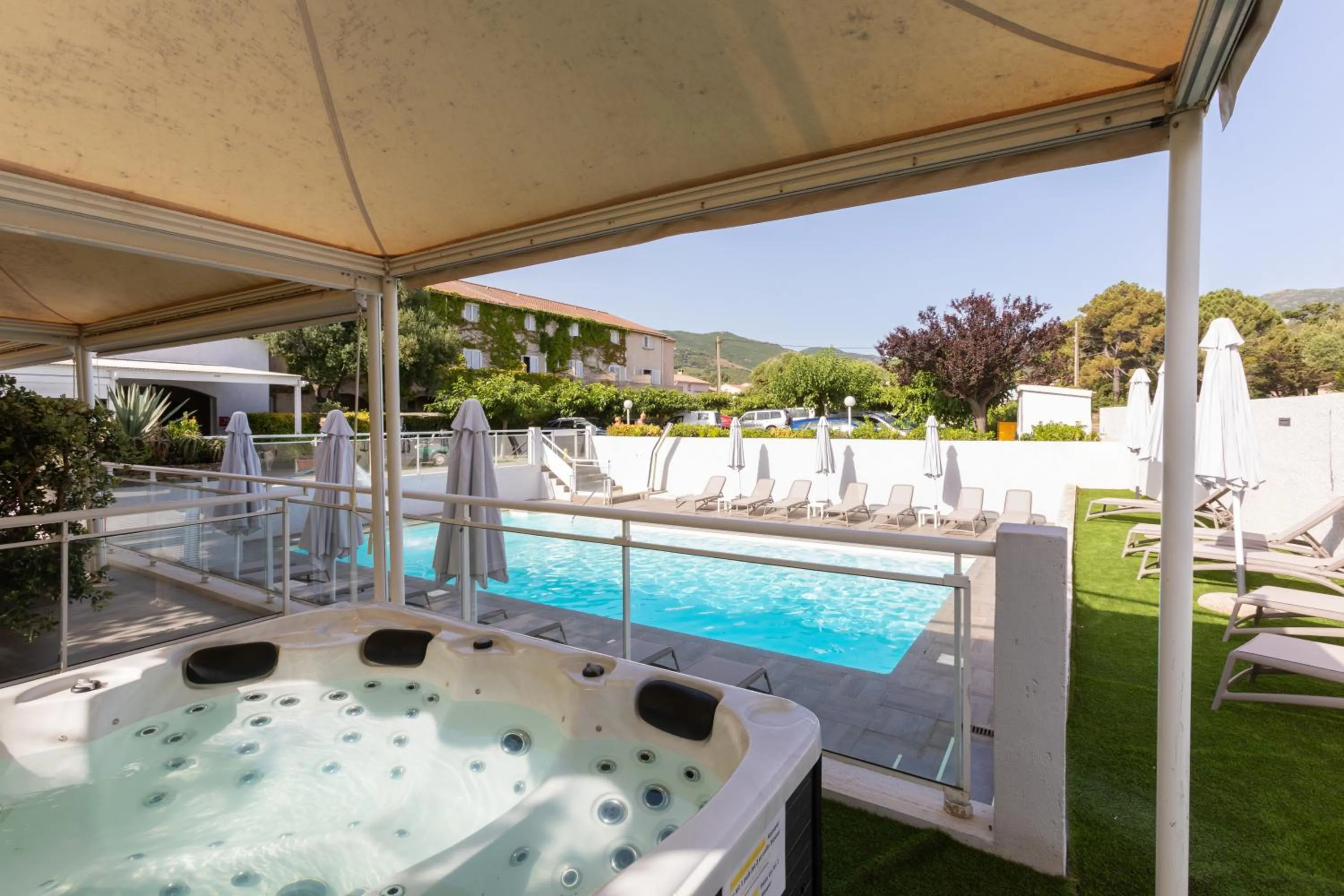 Swimming pool in Hotel U Ricordu & Spa