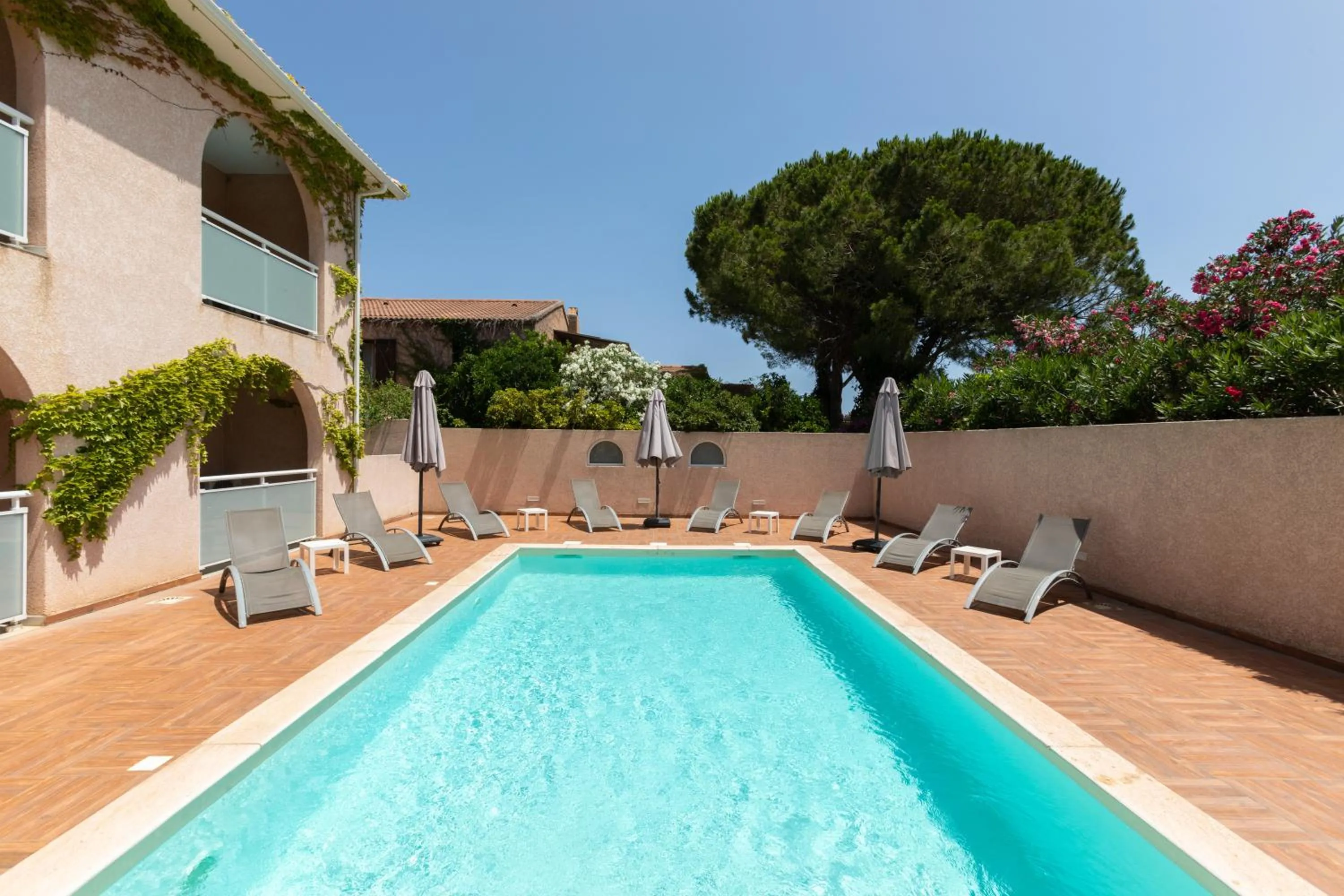 Swimming pool in Hotel U Ricordu & Spa