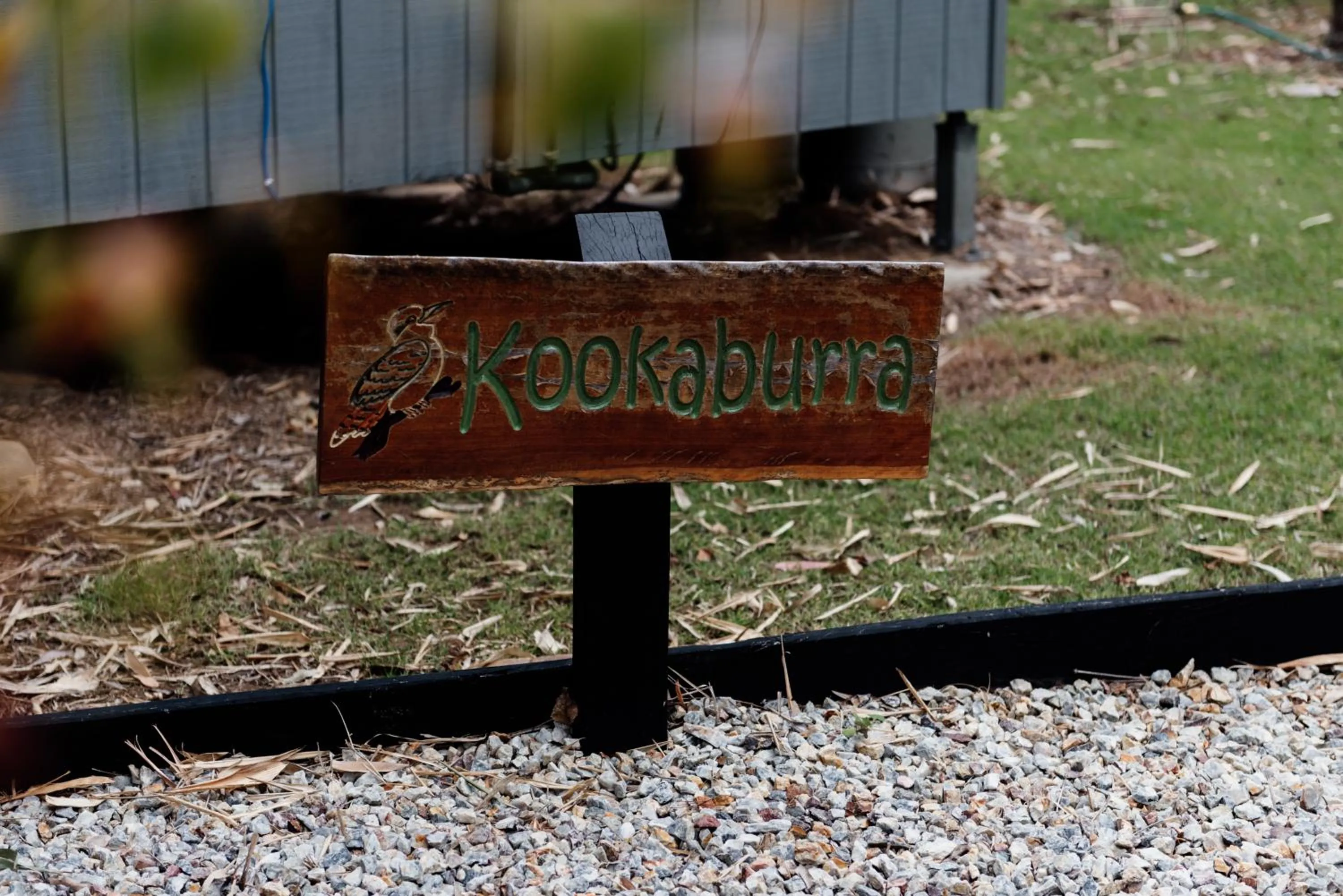 Property logo or sign in Tuckeroo Cottages & Gardens - Blue Wren & Kookaburra