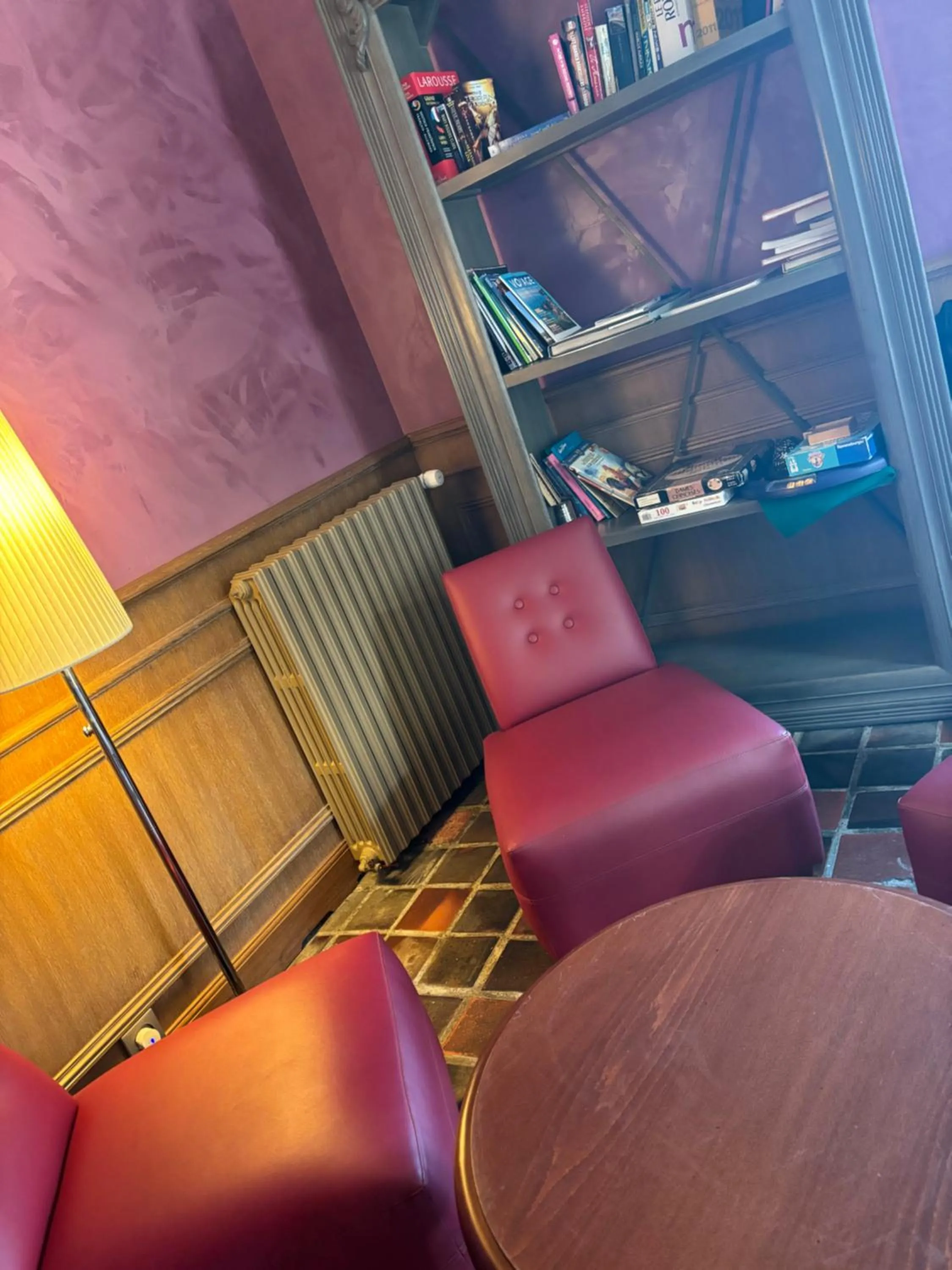 Communal lounge/ TV room in Le Relais Du Roy