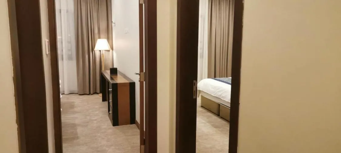 Bed in Tripper Inn Dammam