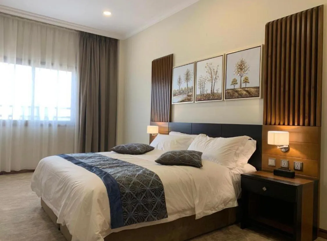 Bed in Tripper Inn Dammam