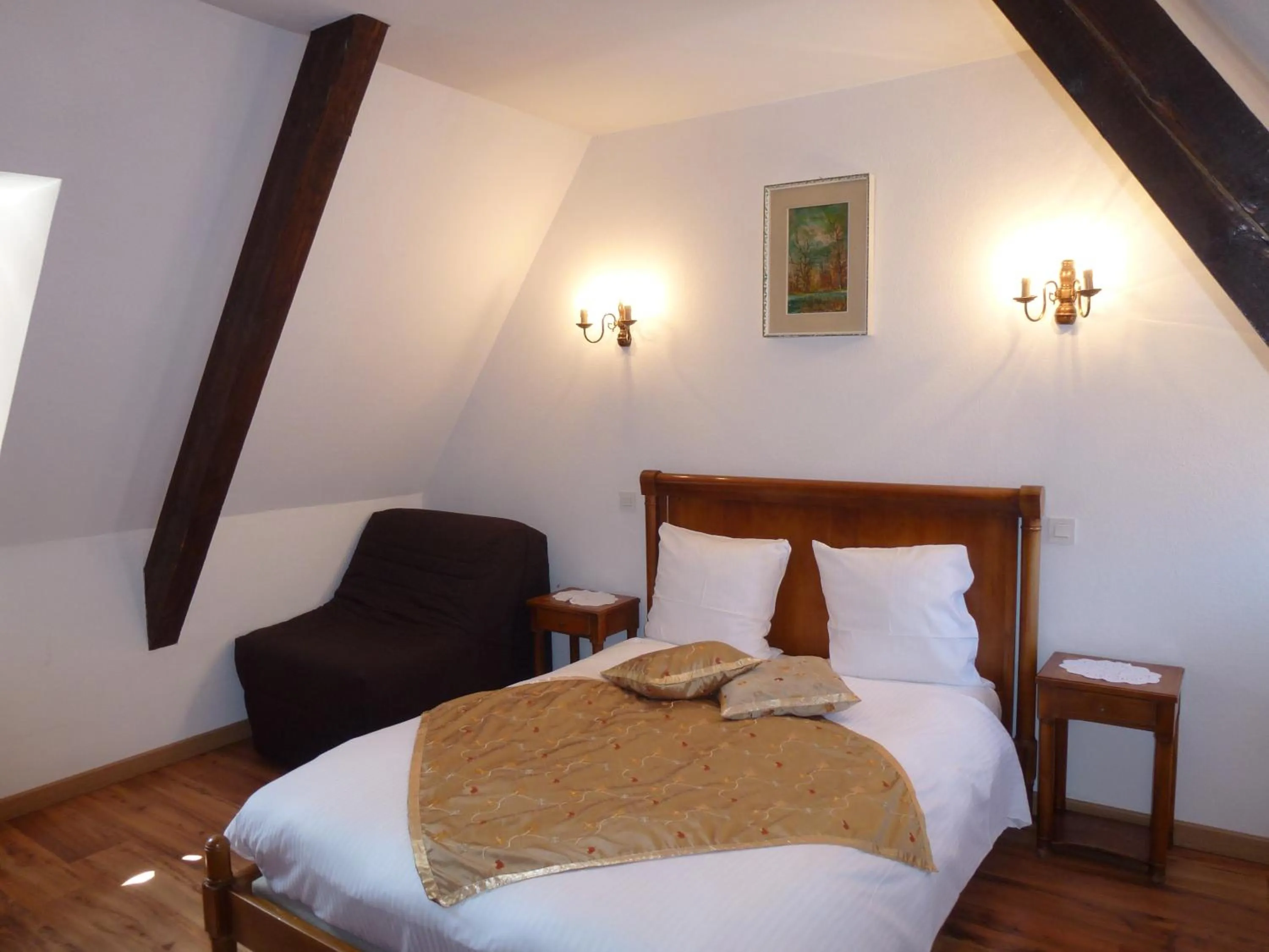 Bed in La Cour du Bailli Suites & Spa