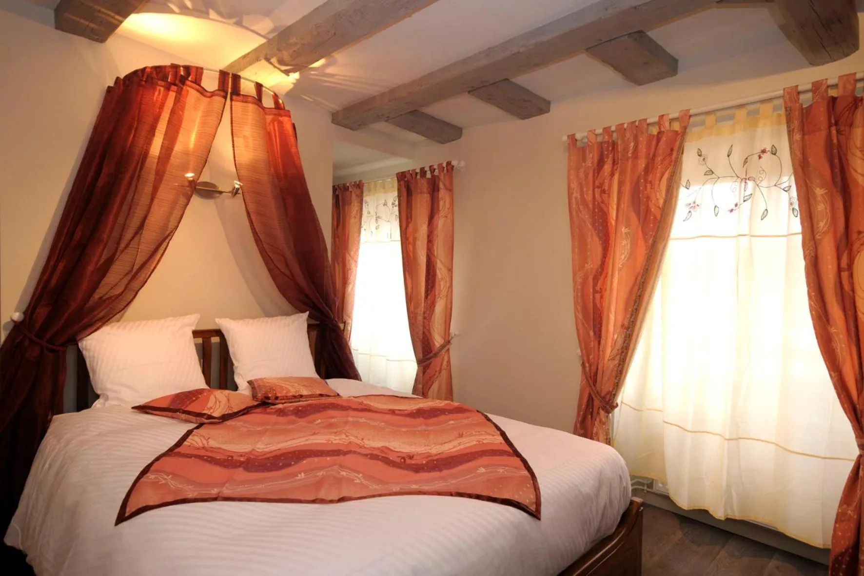 Bed in La Cour du Bailli Suites & Spa