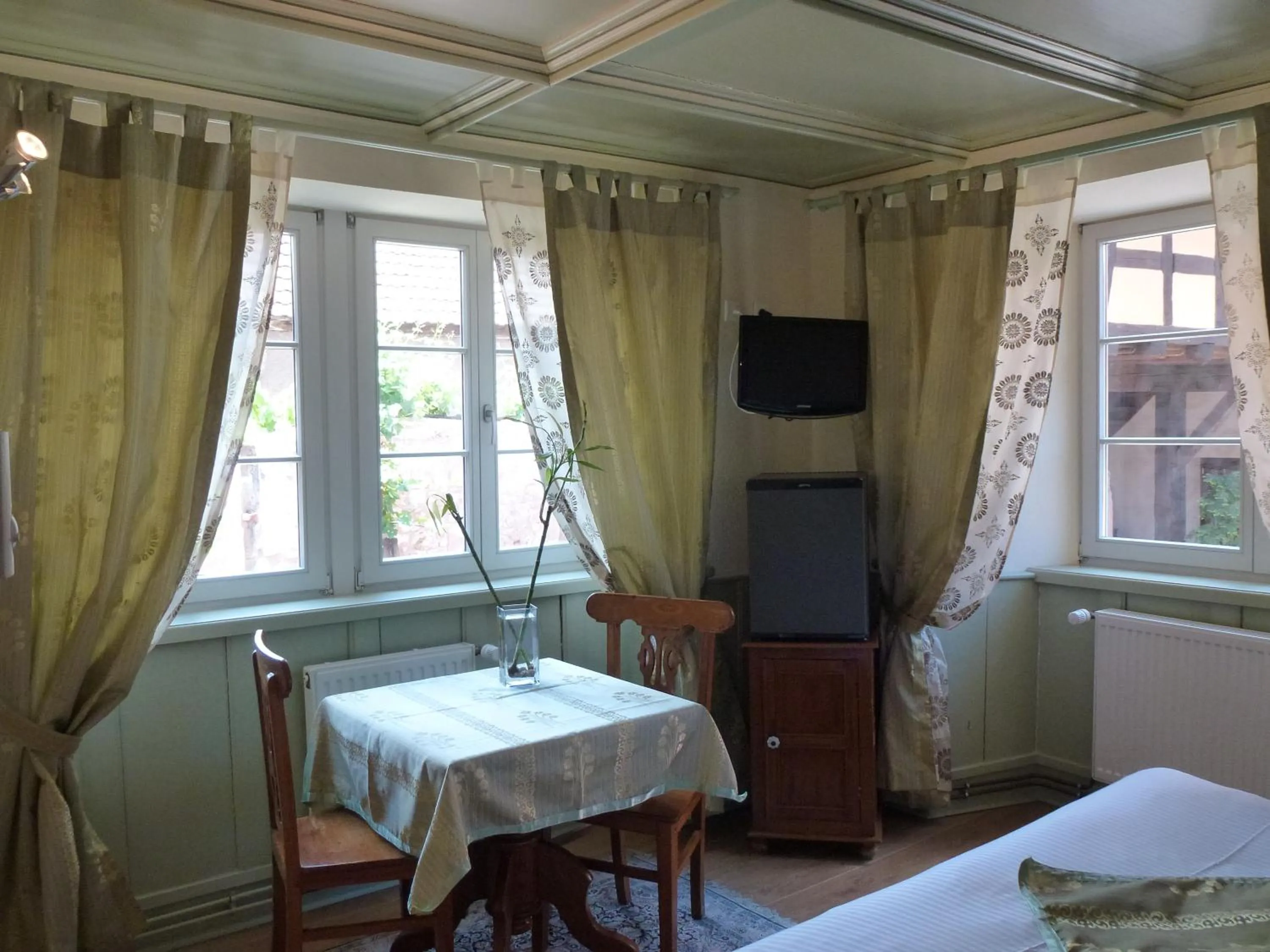 Bed in La Cour du Bailli Suites & Spa