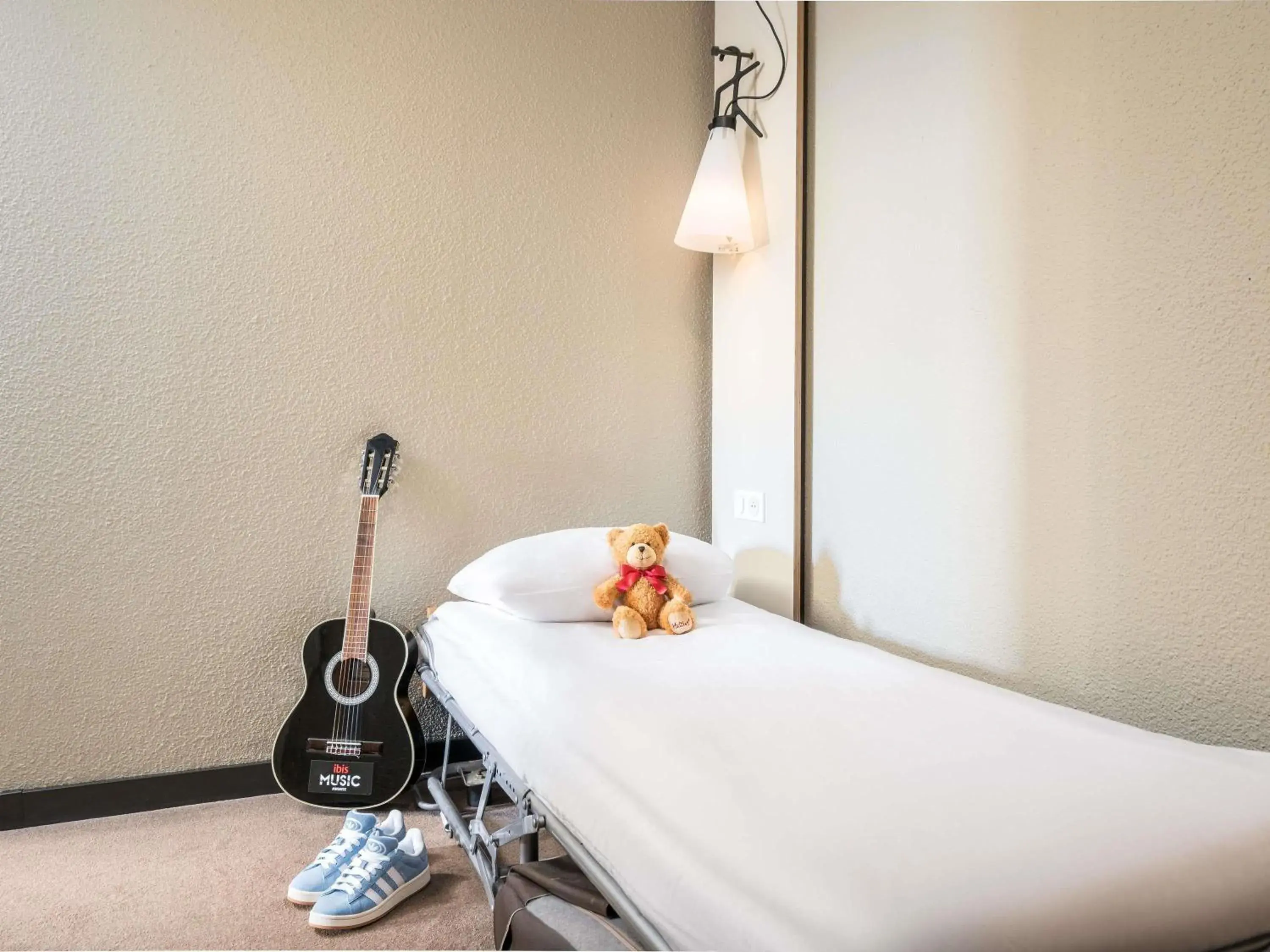 Bedroom in Ibis Lyon Villefranche Sur Saone Bedroom in Ibis Lyon Villefranche Sur Saone