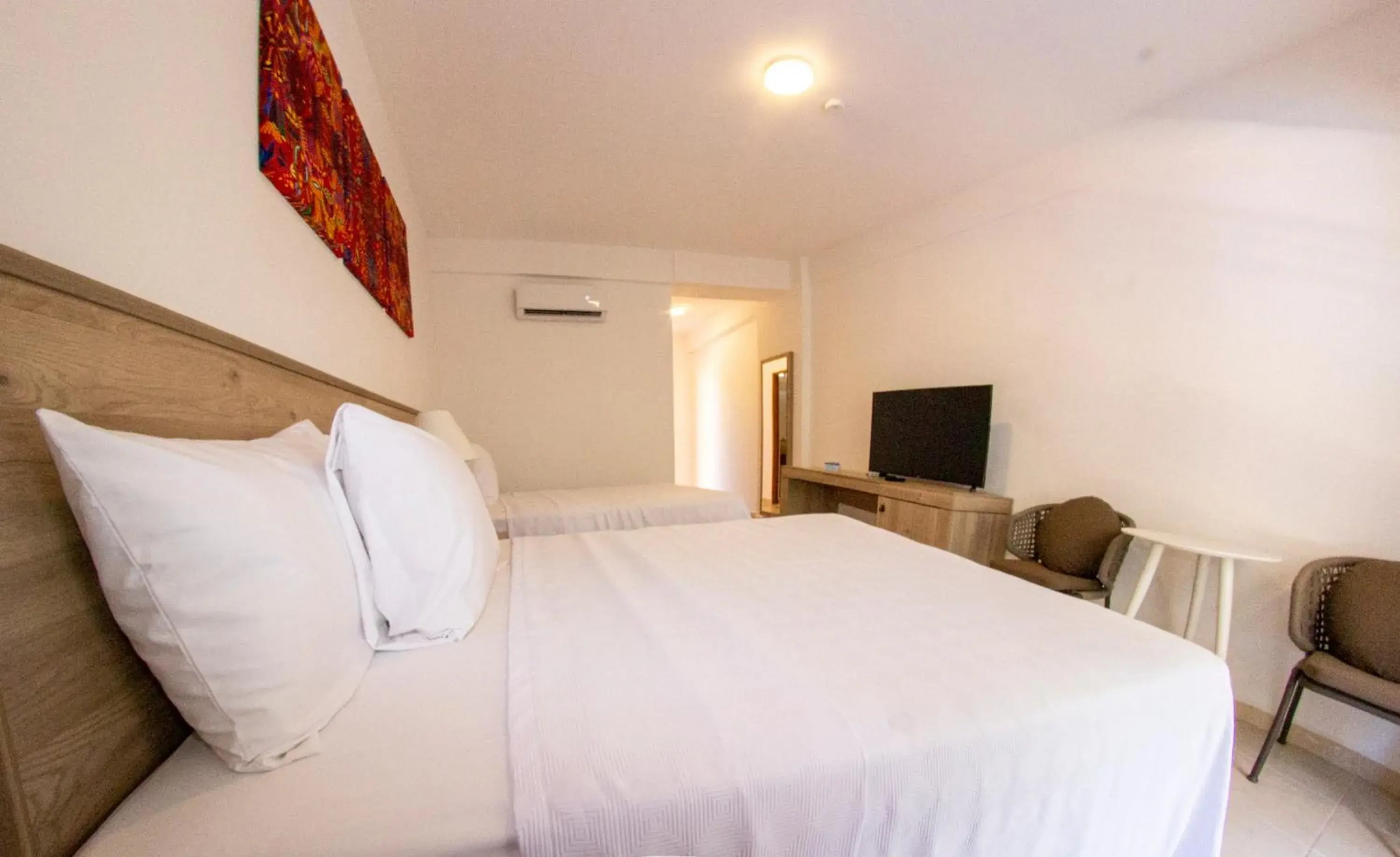 Bed in Decameron Isla Coral Guayabitos, Ramada All-Inclusive Resort Bed in Decameron Isla Coral Guayabitos, Ramada All-Inclusive Resort