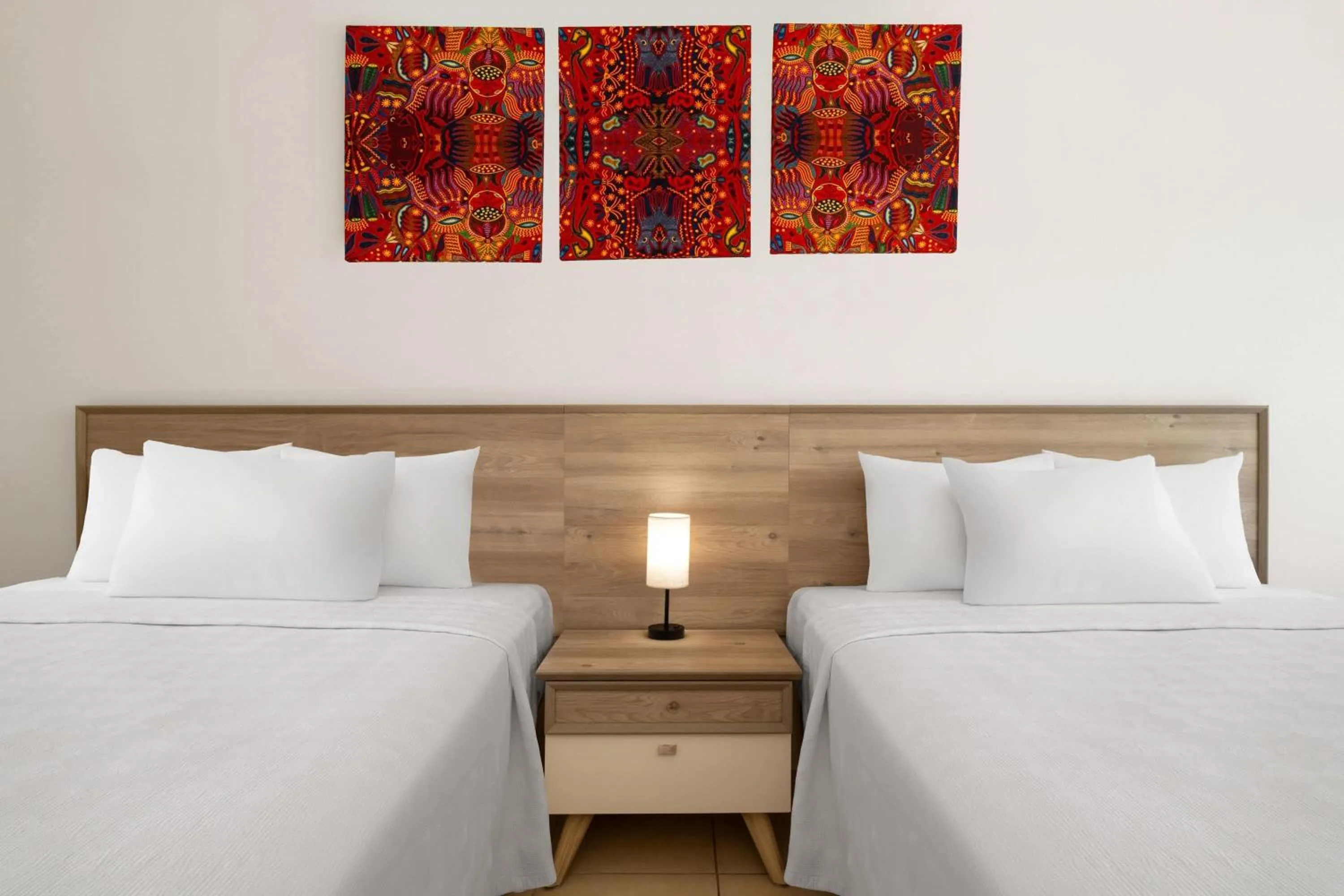 Photo of the whole room, Bed in Decameron Isla Coral Guayabitos, Ramada All-Inclusive Resort