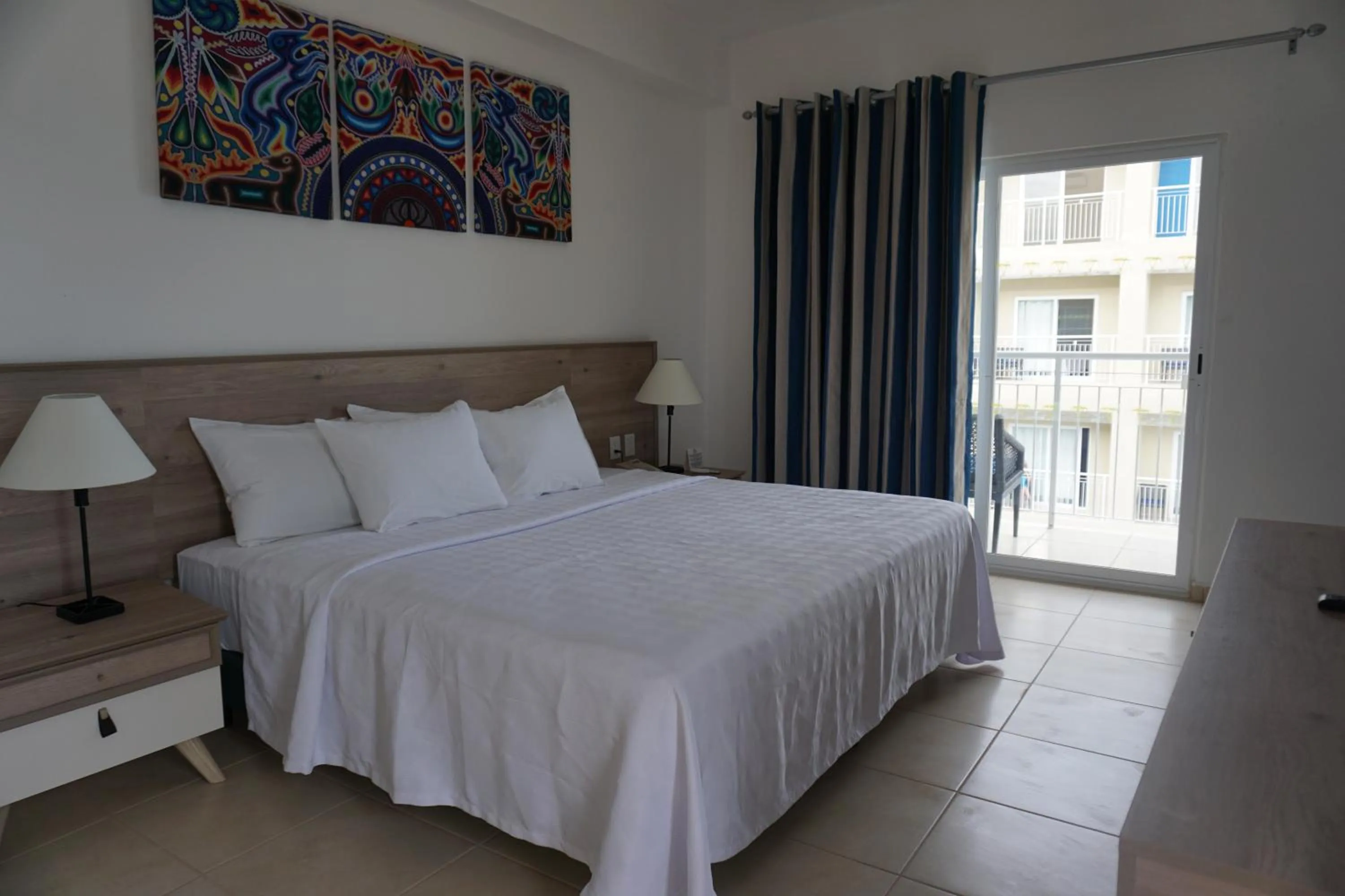 Bed in Decameron La Marina Guayabitos, Ramada All-Inclusive Resort