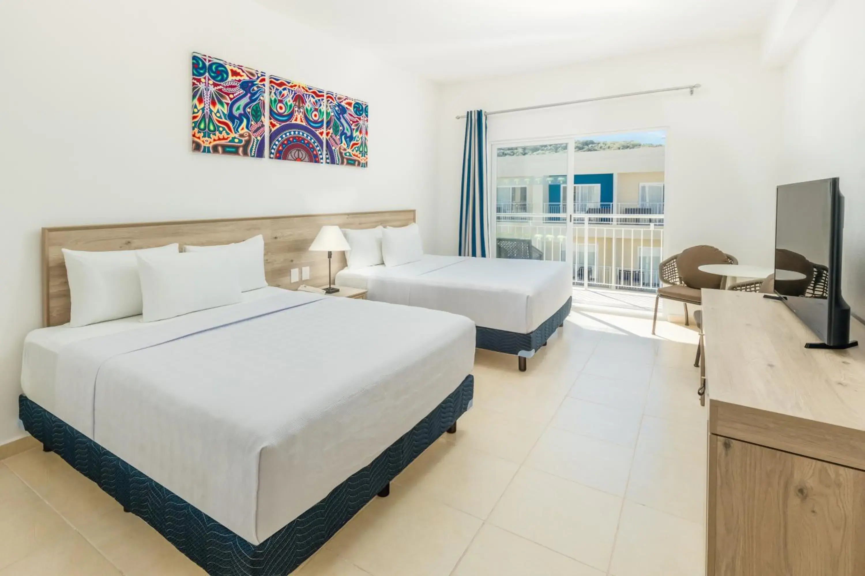 Bed in Decameron La Marina Guayabitos, Ramada All-Inclusive Resort Bed in Decameron La Marina Guayabitos, Ramada All-Inclusive Resort