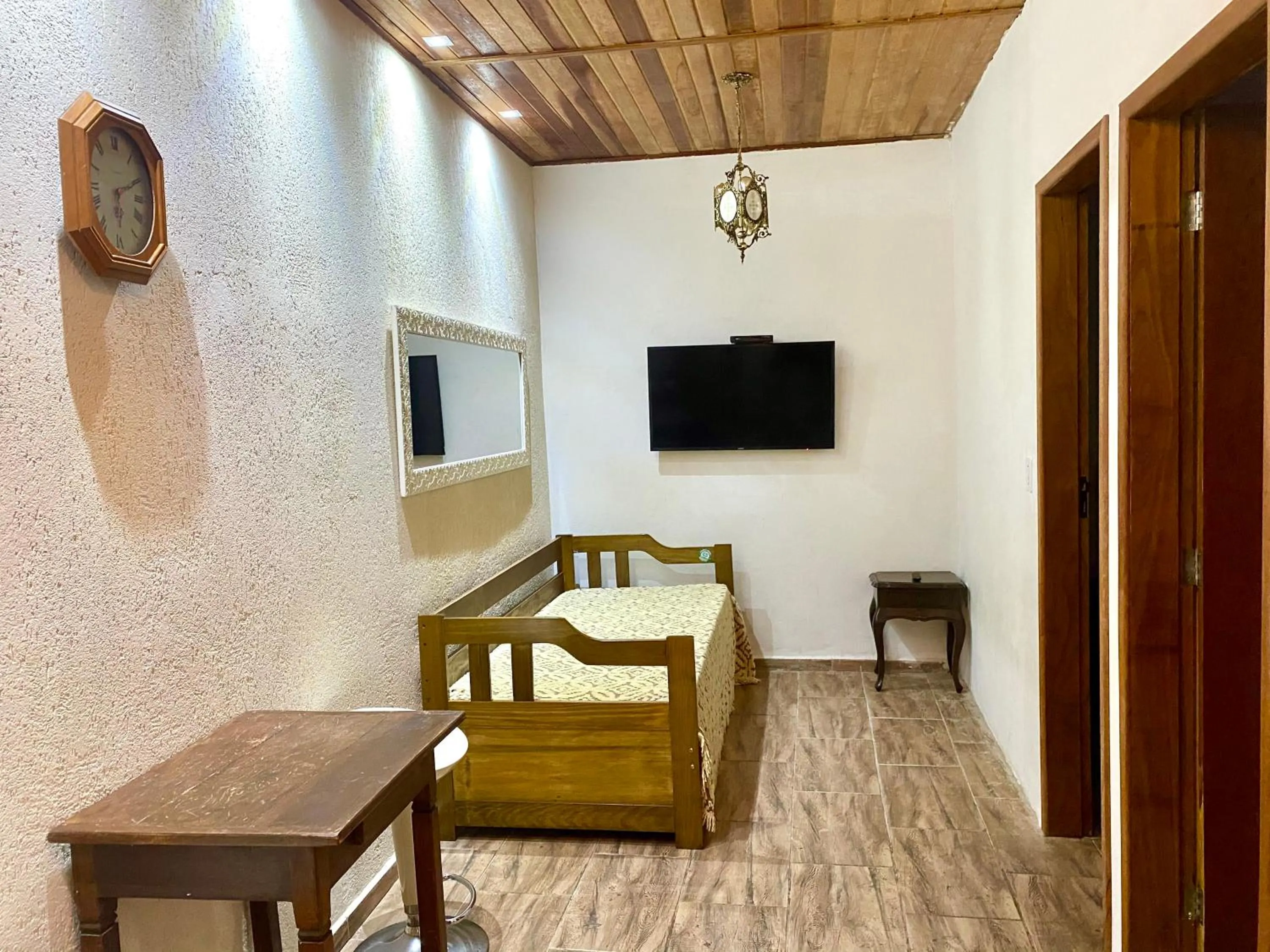 Living room in Chalés Marinelli em São Roque