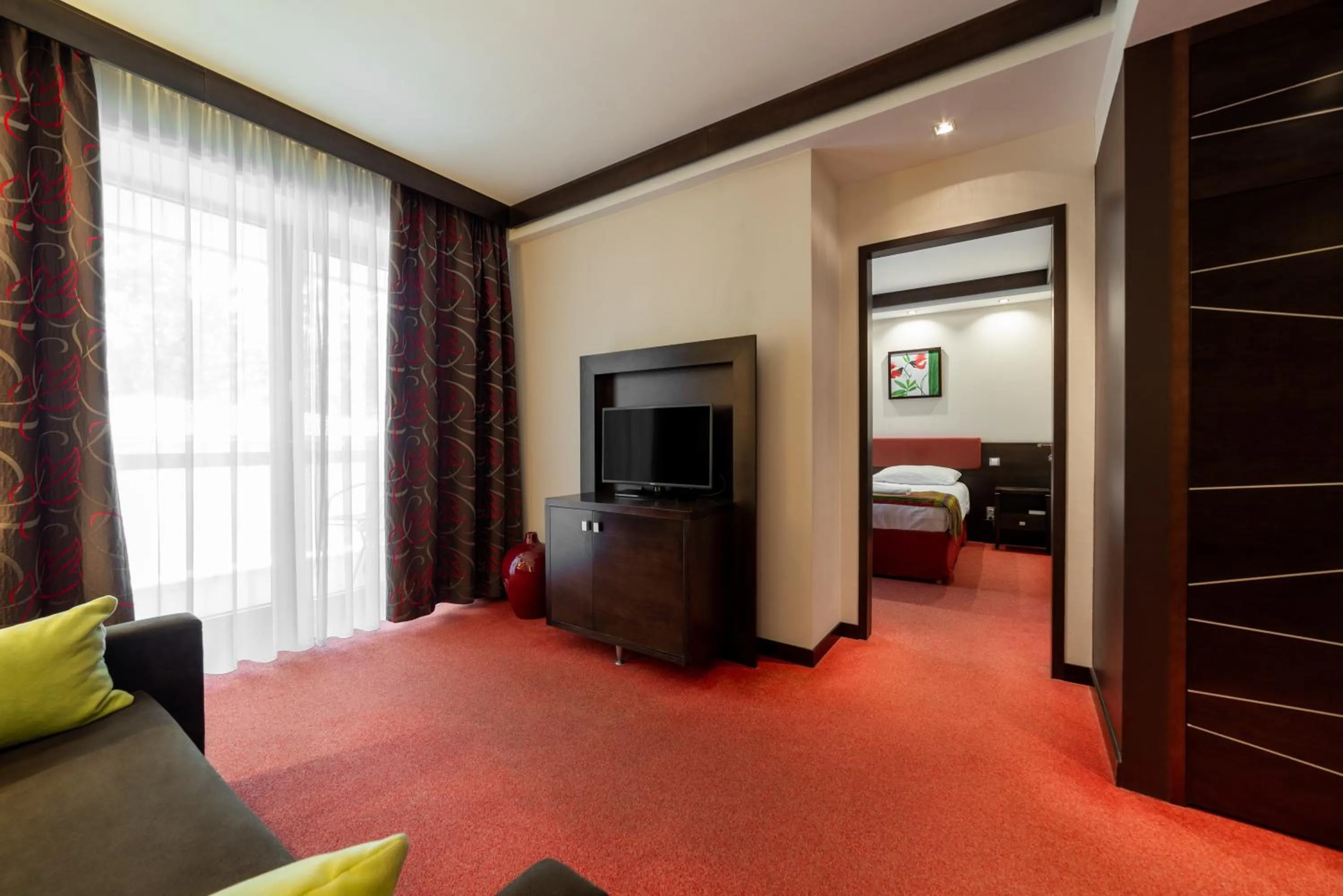Living room, Bed in Hotel Pagony Wellness