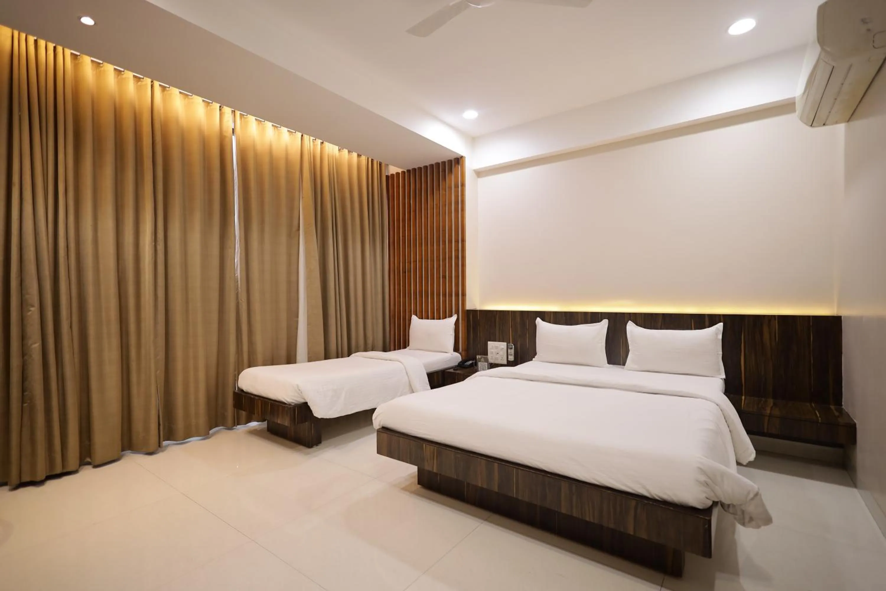 Bed in Hotel President Banquet & Lawn