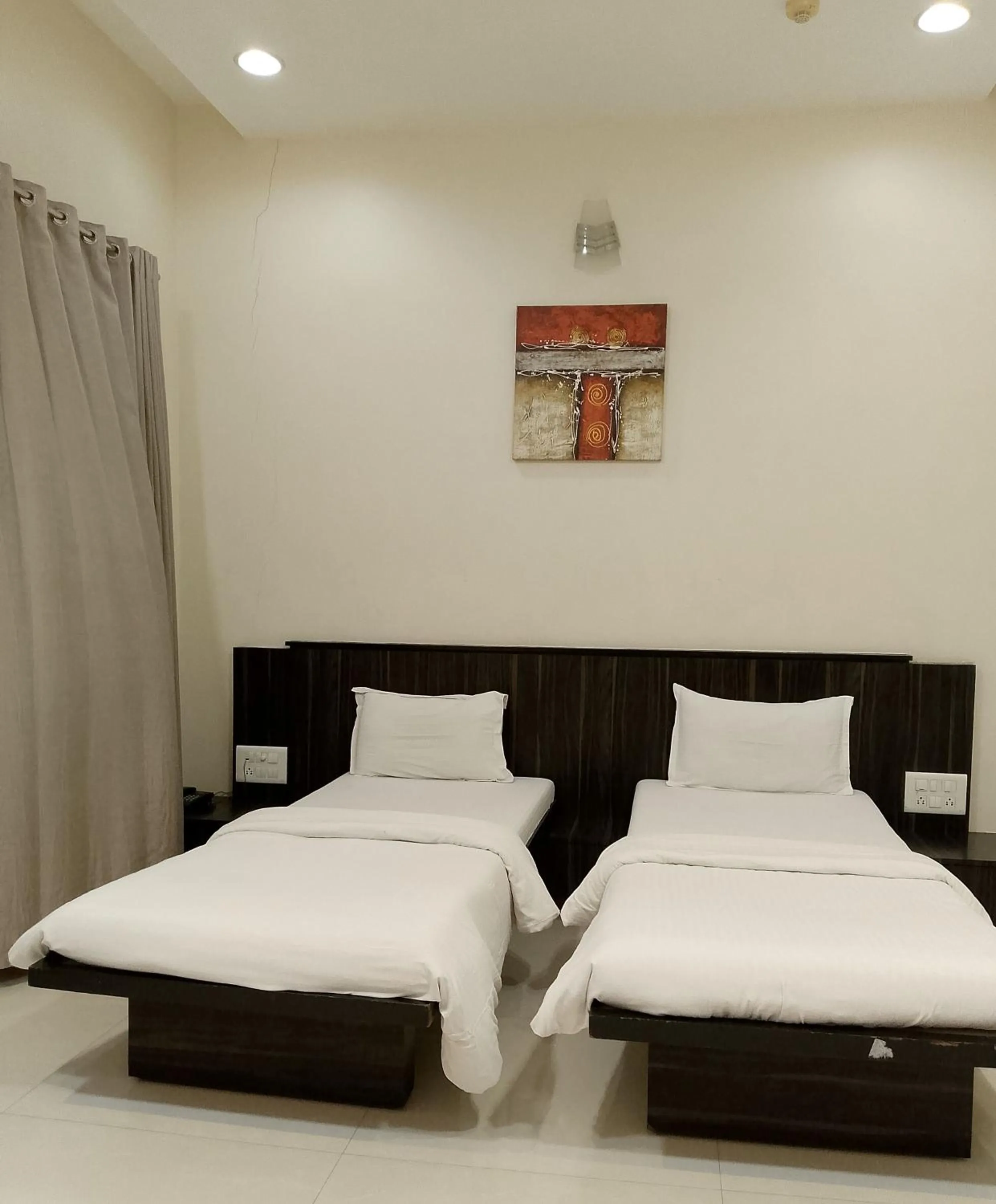 Bed in Hotel President Banquet & Lawn