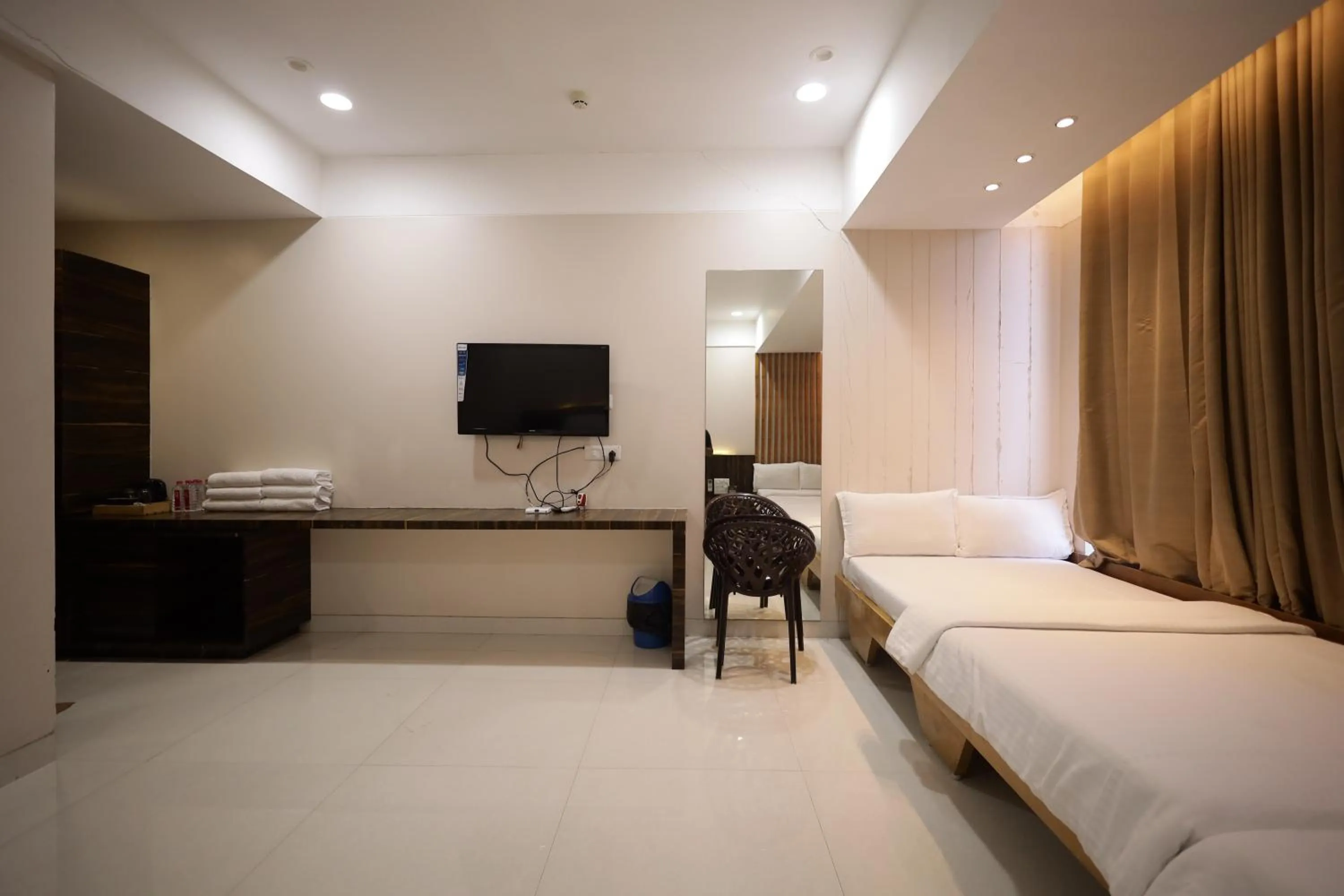 Bed in Hotel President Banquet & Lawn