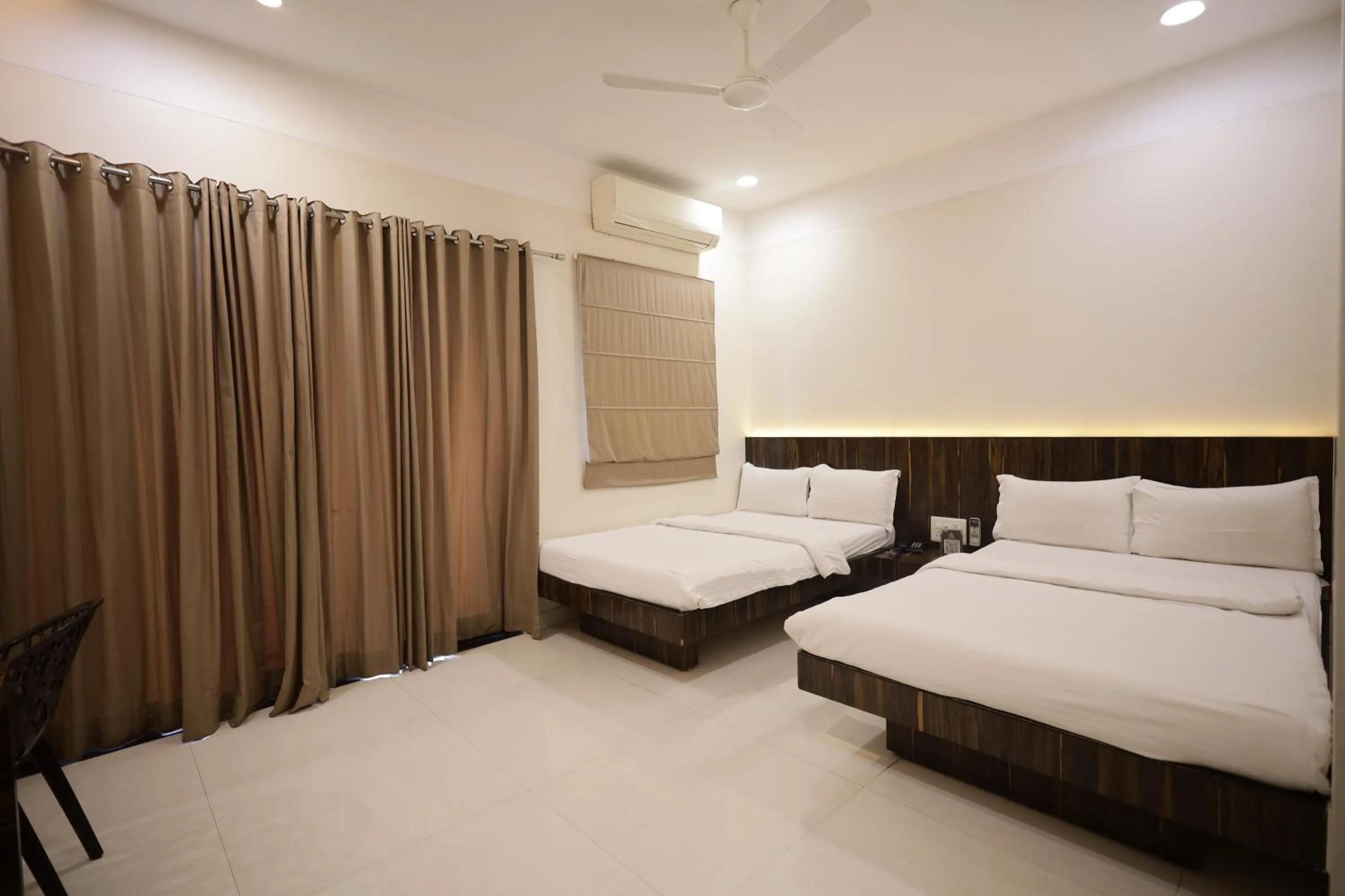 Bed in Hotel President Banquet & Lawn