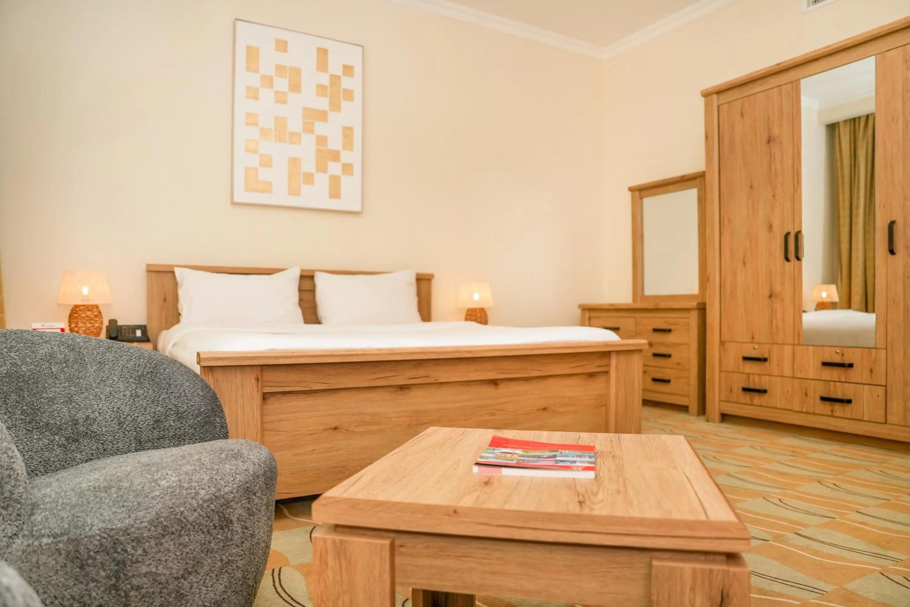 Seating area, Bed in Swiss-Belinn Doha