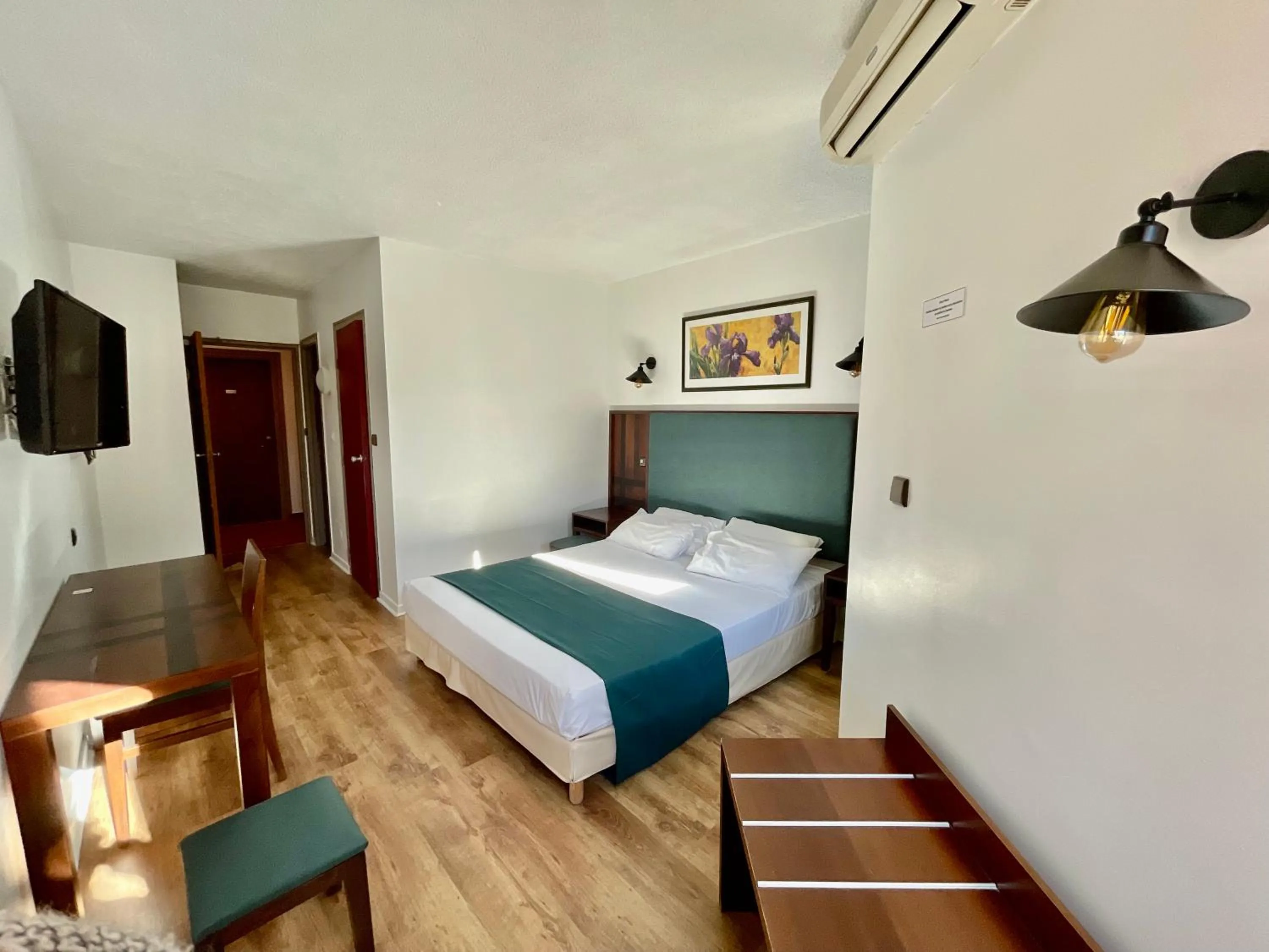 Bed in Tropic Hôtel