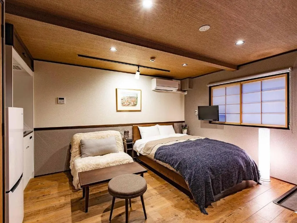 Bed in Wow! KANAZAWA STAY