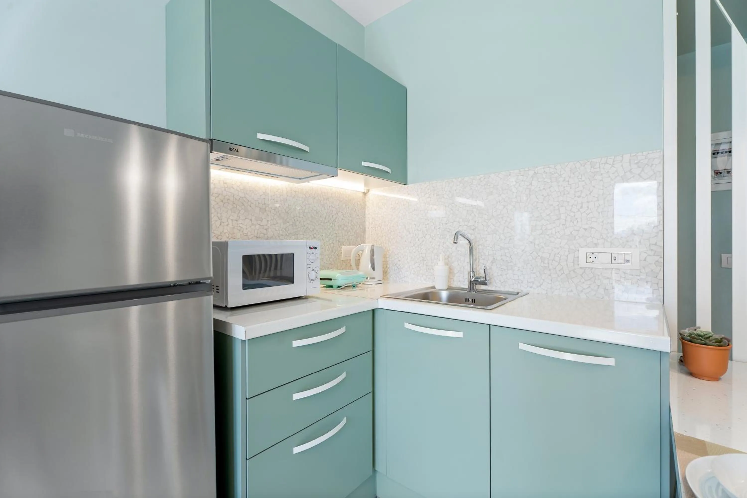 Kitchen or kitchenette in Frunze Luxury Apartments